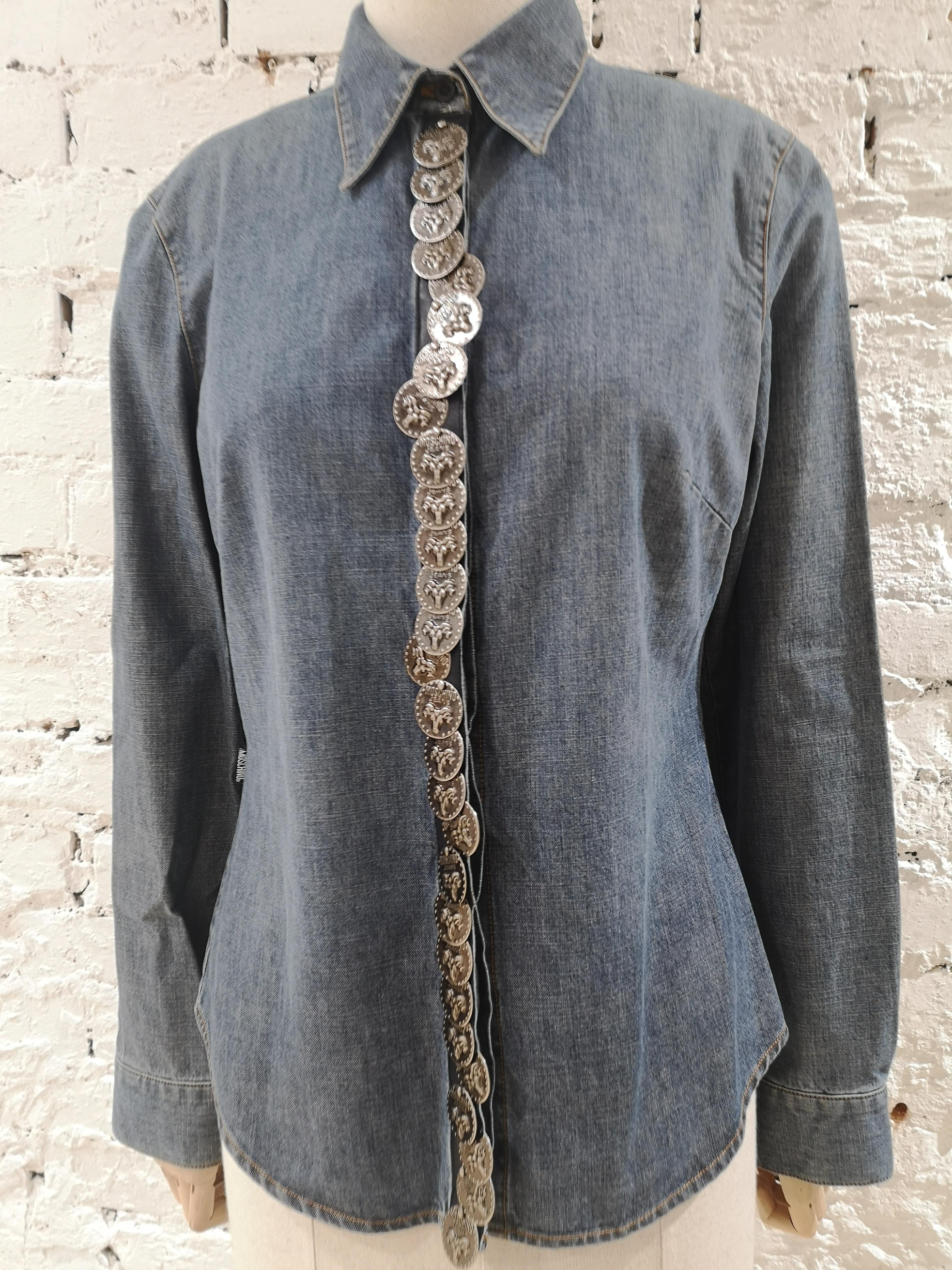 Moschino Denim Shirt
Moschino Denim shirt embellished with coins on the front
totally made in italy in size 42
