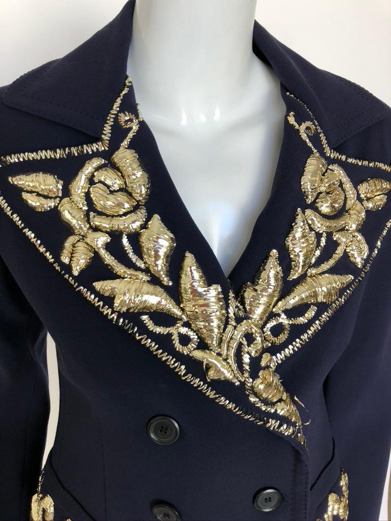 Double breasted blazer with heavily embellished embroidery, very chic.