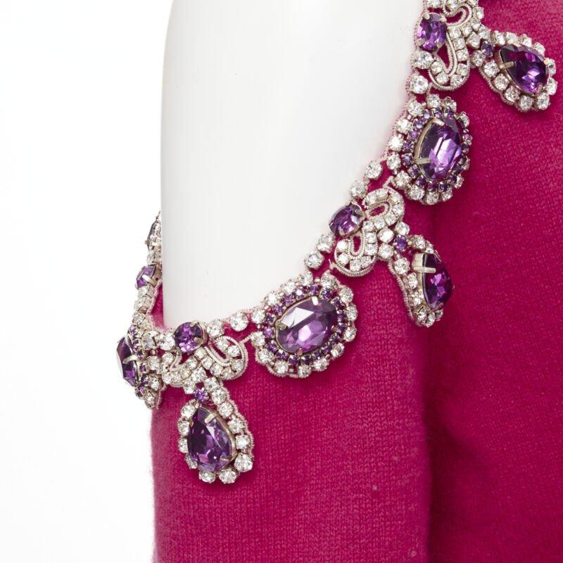 MOSCHINO fuschia pink cashmere crystal jewel cold shoulder cardigan IT38
Reference: TGAS/B02120
Brand: Moschino
Designer: Jeremy Scott
Collection: 2019
Material: Cashmere, Wool
Color: Pink
Pattern: Solid
Closure: Button
Extra Details: Purple and