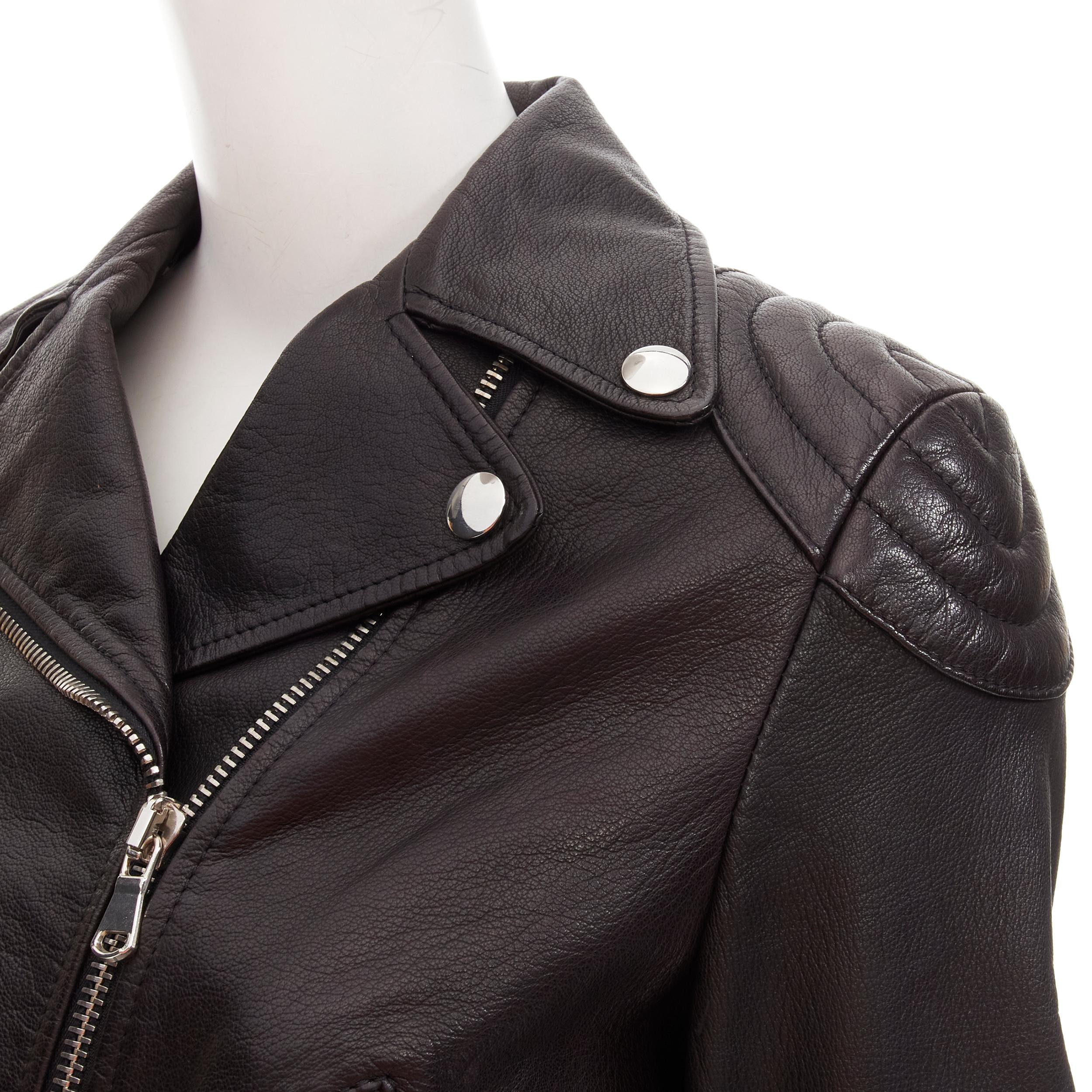 MOSCHINO genuine leather black classic cropped moto biker jacket IT40 S
Reference: TGAS/C01925
Brand: Moschino
Designer: Jeremy Scott
Material: Leather
Color: Black
Pattern: Solid
Closure: Zip
Lining: Black Fabric
Extra Details: Padded shoulder