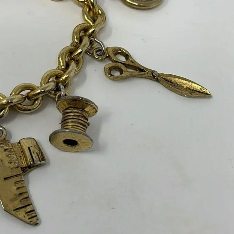 Moschino Gold Tone Sewing Charm Bracelet Vintage In Good Condition For Sale In Los Angeles, CA