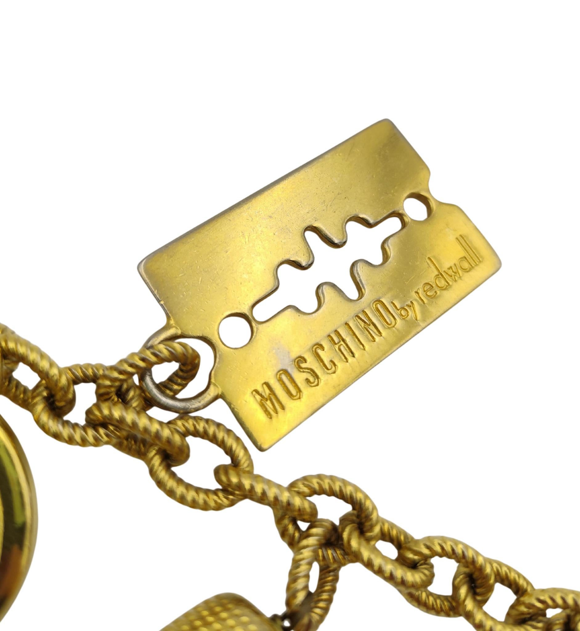 Cinturón Moschino de metal dorado con doble cadena colgante en venta 5