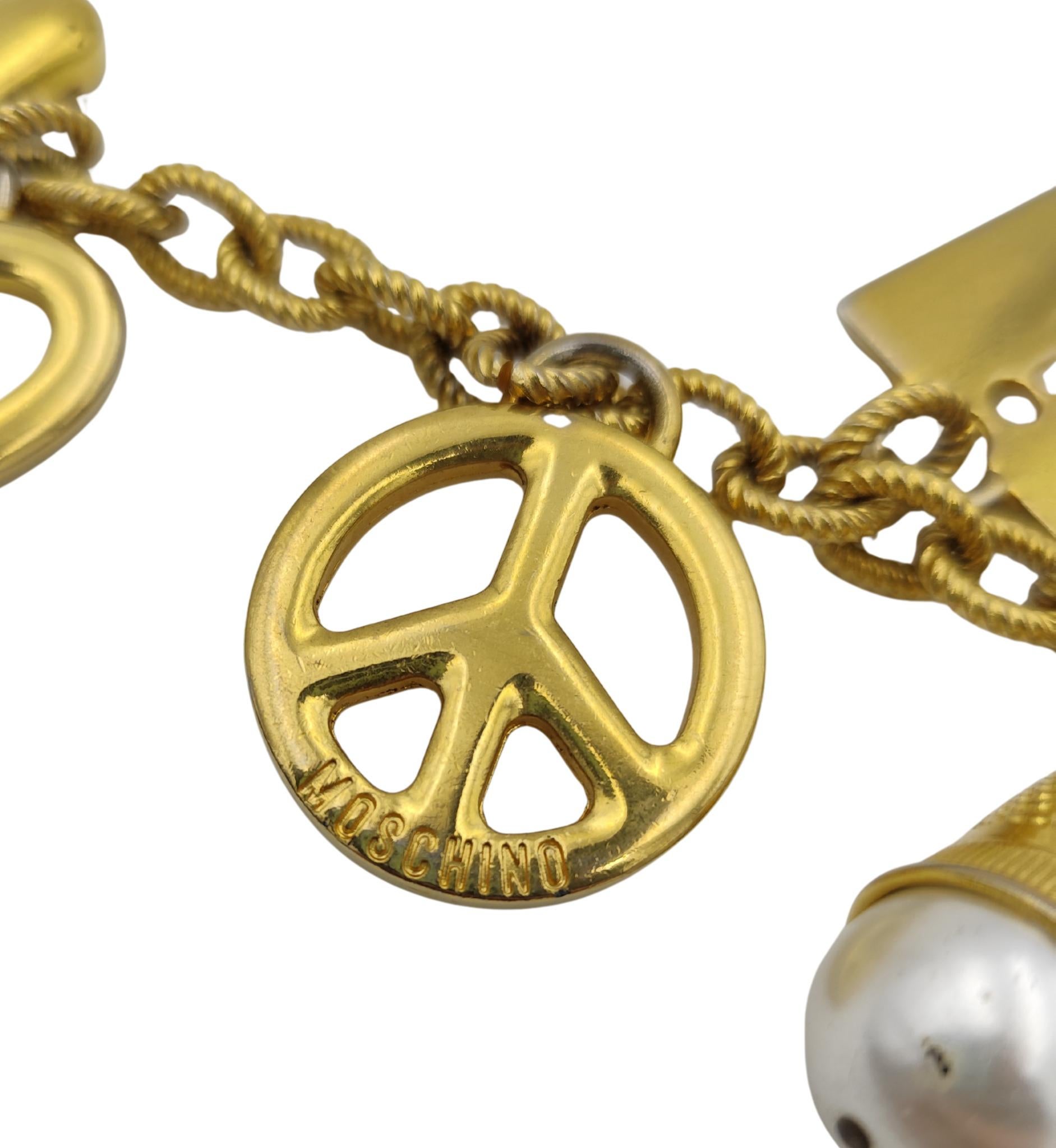 Cinturón Moschino de metal dorado con doble cadena colgante en venta 2