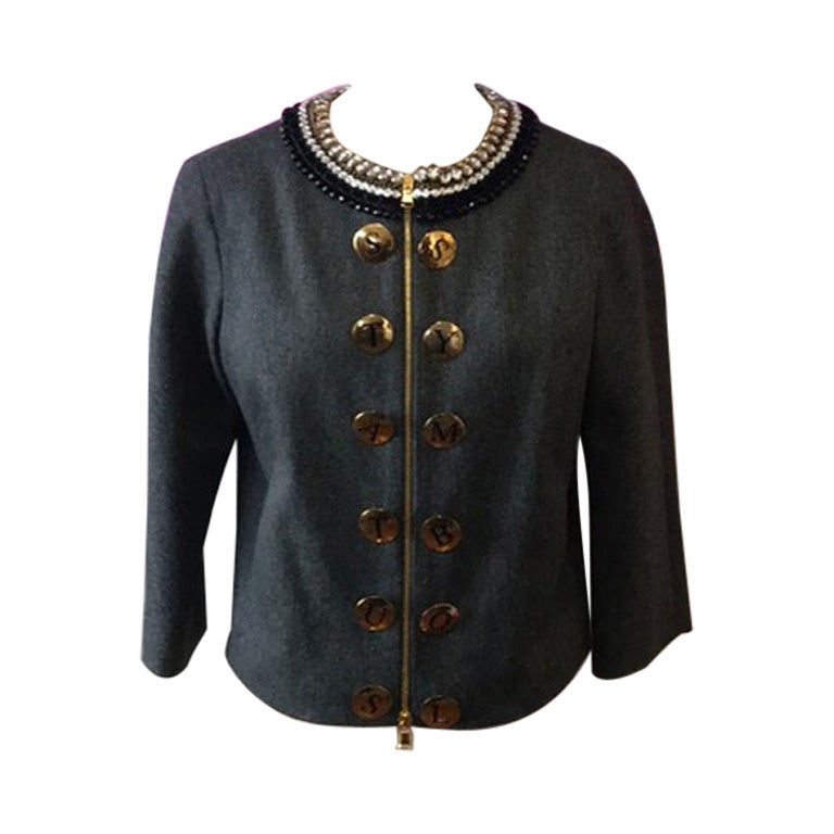 Moschino Veste en laine grise symbole de statut social