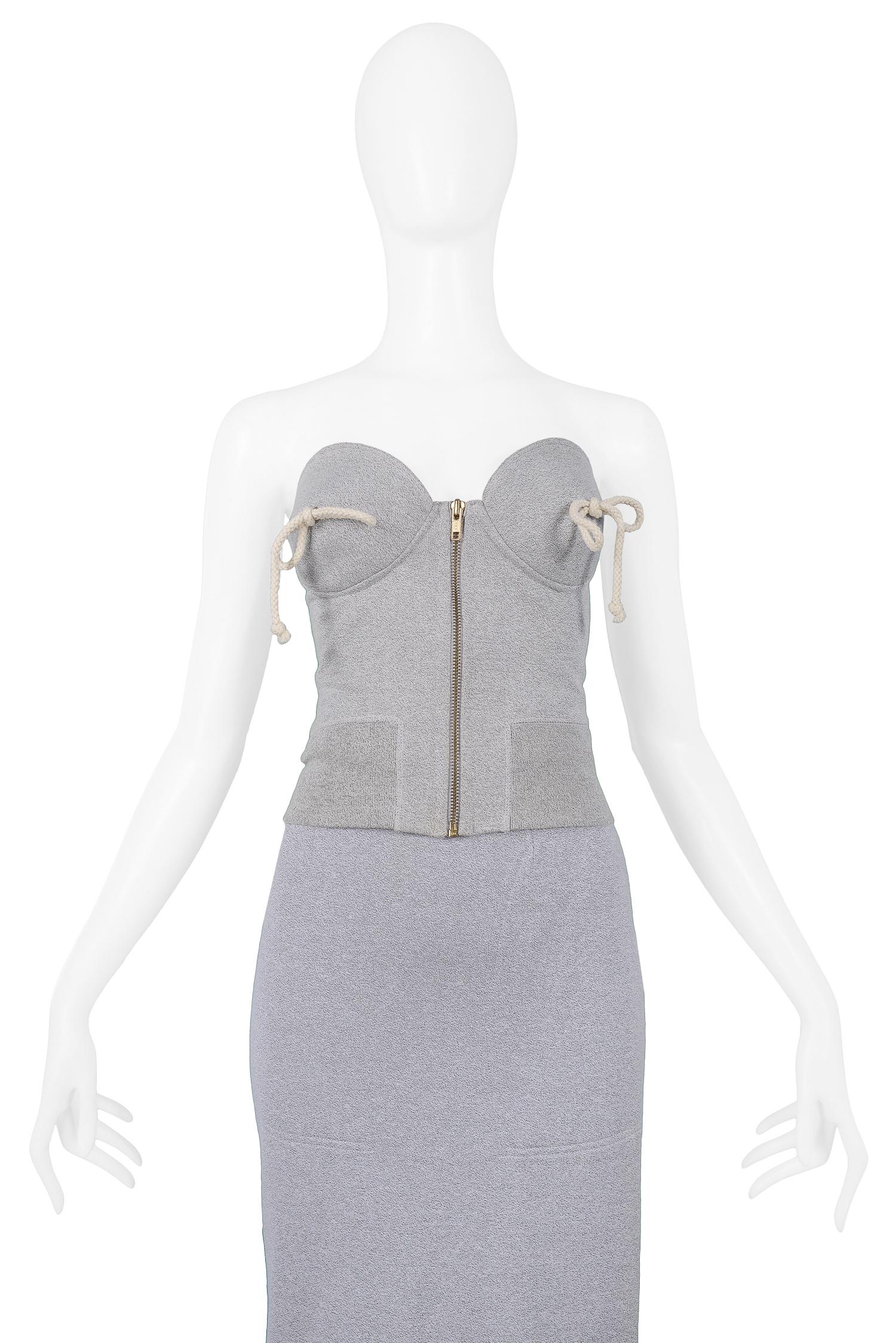 Resurrection Vintage is excited to offer a vintage Moschino sweatshirt fabric bustier with center front zip enclosure and rope-tie detail at the bust. 

Moschino
Size IT 42
Cotton Sweatshirt 
1994 Collection 
Excellent Vintage Condition
Authenticity