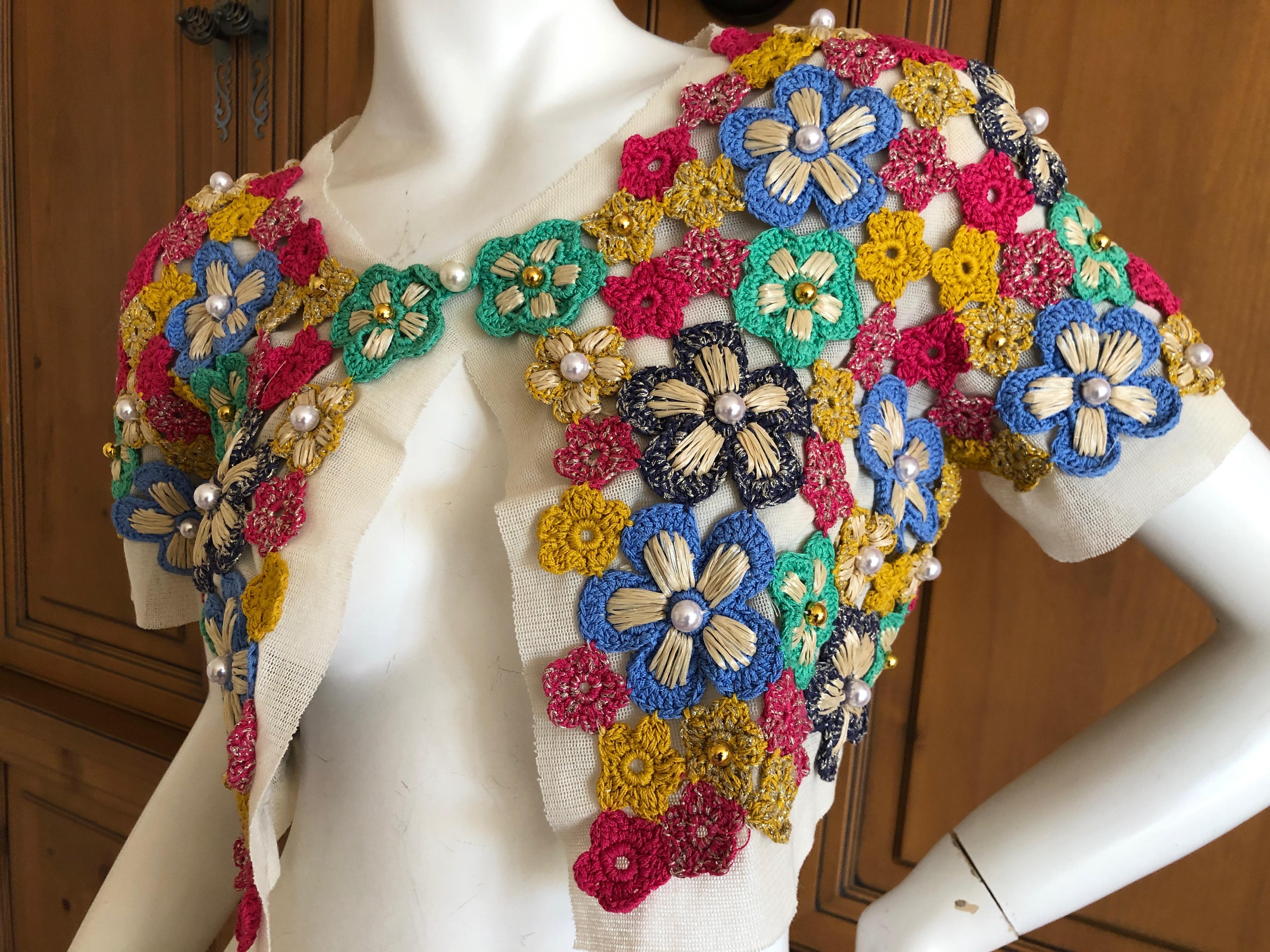 Moschino Hippy Chick Crochet Embellished Shrug for Moschino Cheap & Chic
So festive and fun, use zoom to see details.
Perfect for Festival wear

US sz 4.

Bust 36
