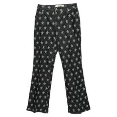 Moschino Jeans Schwarze Jeans mit Sterndruck und ausgestelltem Bein aus Denim S