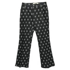 Moschino Jeans in Schwarz  Star Print Denim Jeans mit ausgestelltem Bein S