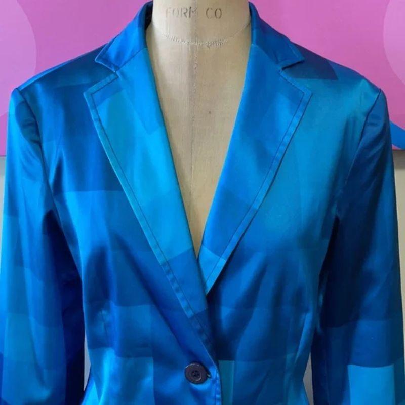 Moschino jeans blue plaid stretch satin blazer

This jacket was made famous when worn on the hit TV Show The Nanny! Pristine condition.

Size 10
Across chest - 19 1/2 in.
Across waist - 16 1/2 in.
Shoulder to hem - 27th 1/2 in.
Shoulder to cuff - 24