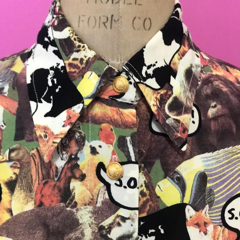 Moschino jeans comic long sleeve shirt

Moschino brand is know for its humor and this super fun shirt is no exception. Animals are all over with word bubbles that says S.O.S. or HELP. Mouse. Chicken. Cow. Dog. Rabbit. Bear. Fox. Cat. and more. Pair