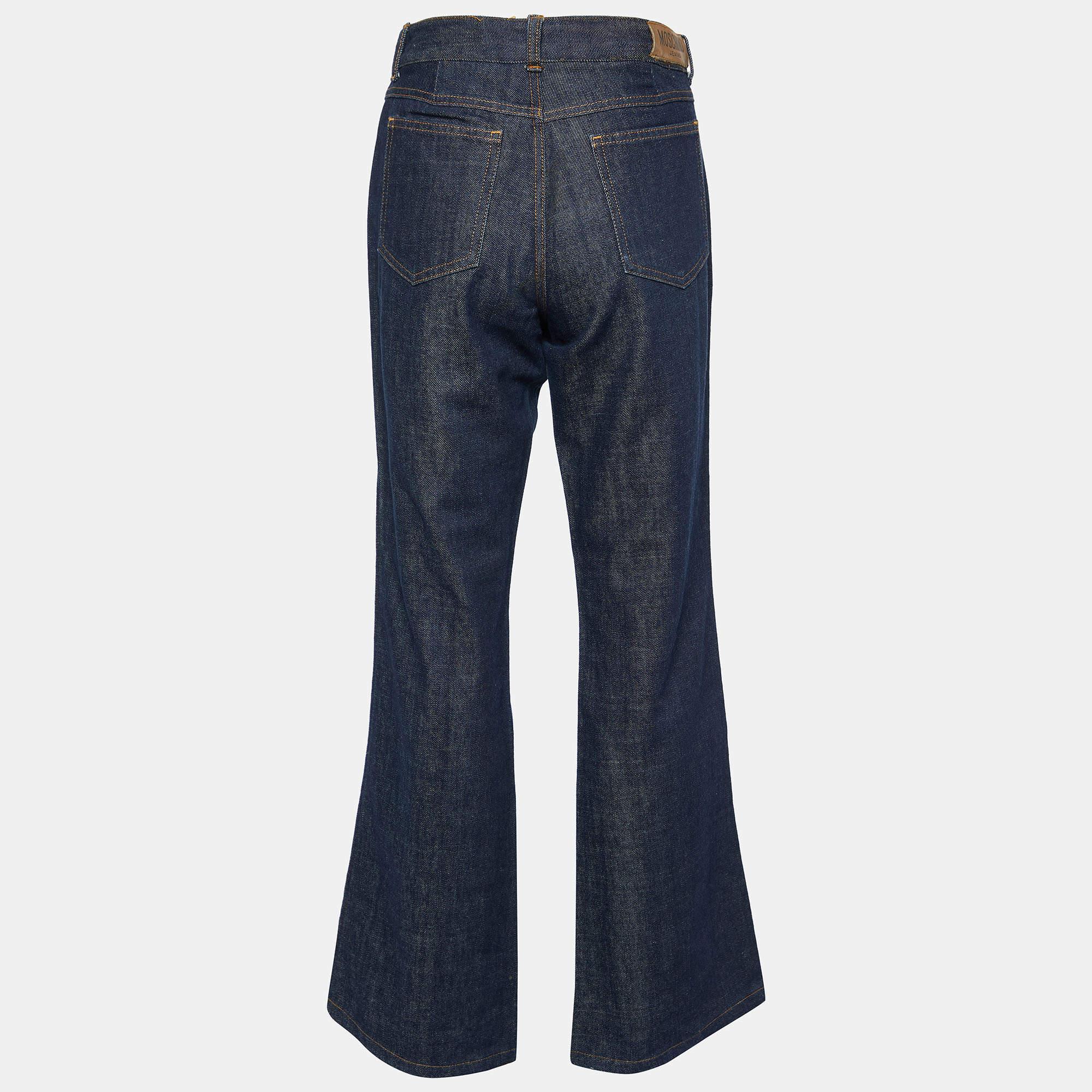 These jeans are designed to sit comfortably on your waist and look great with plain T shirts or even printed ones. The pair features a front zip closure five pockets and stud details.