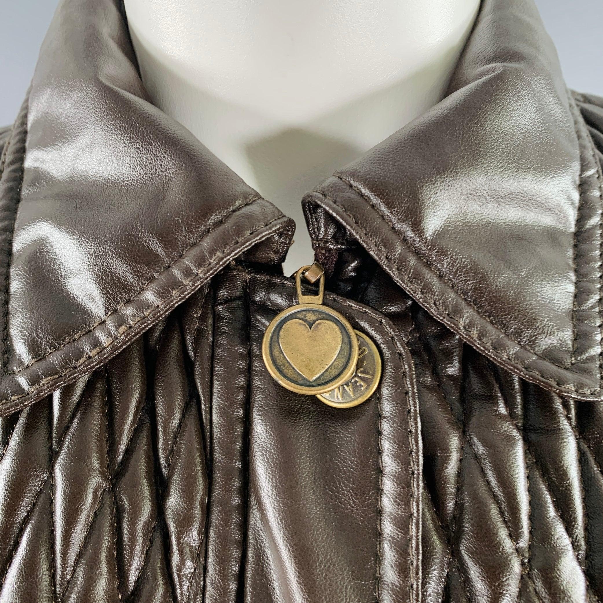 MOSCHINO JEANS jacket
in a brown polyamide polyester blend faux leather featuring a quilted style, zip pockets, and zip & snap closure. Made in Italy.Very Good Pre-Owned Condition. Signs of wear in lining, as is. 

Marked:   IT 40 

Measurements: 
