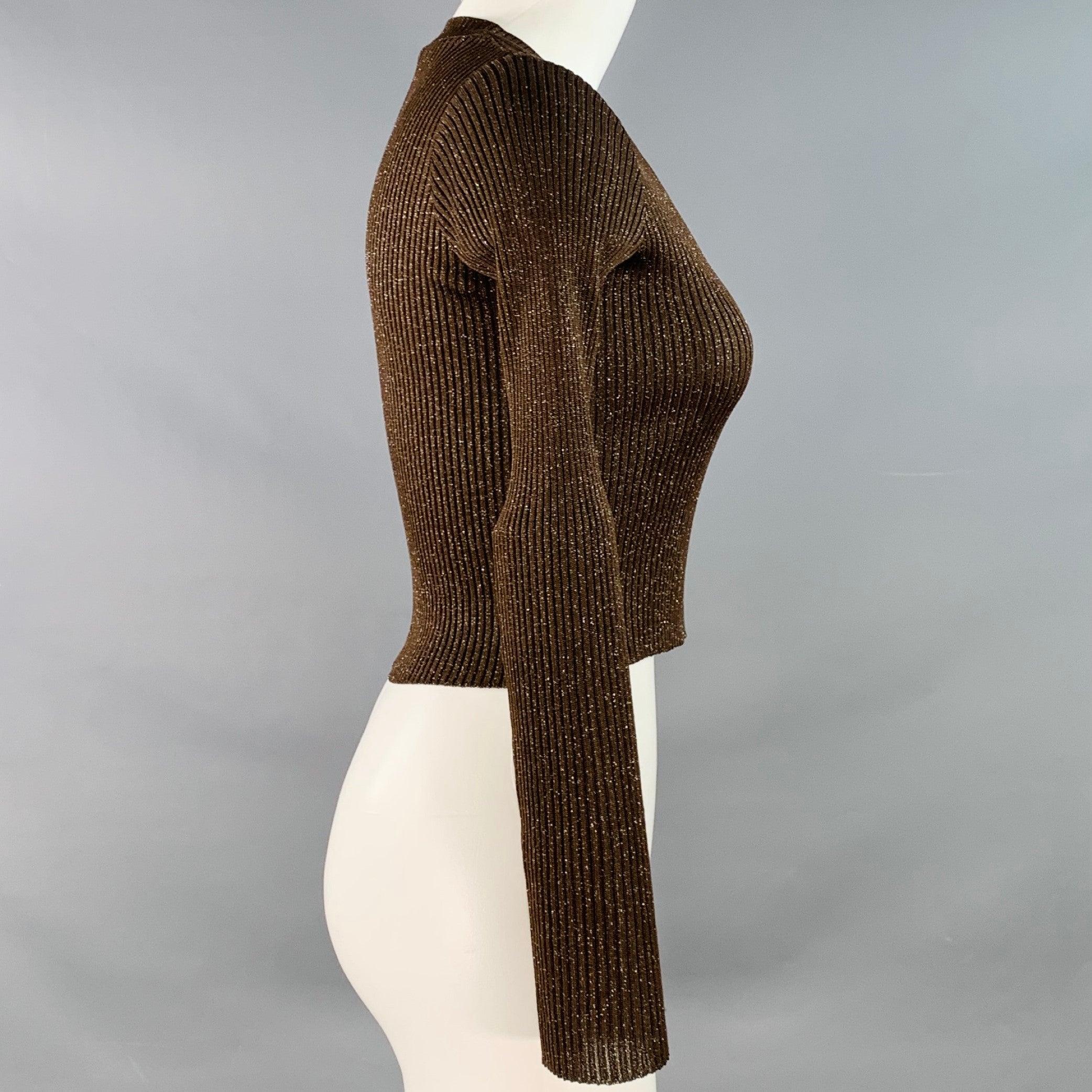 MOSCHINO JEANS pullover
in a brown and metallic gold tone acetate blend knit featuring an all over rib knit design, long sleeves, and V-neck. Made in Italy.Excellent Pre-Owned Condition.  

Marked:   IT 40 

Measurements: 
 
Shoulder: 13.5 inches
