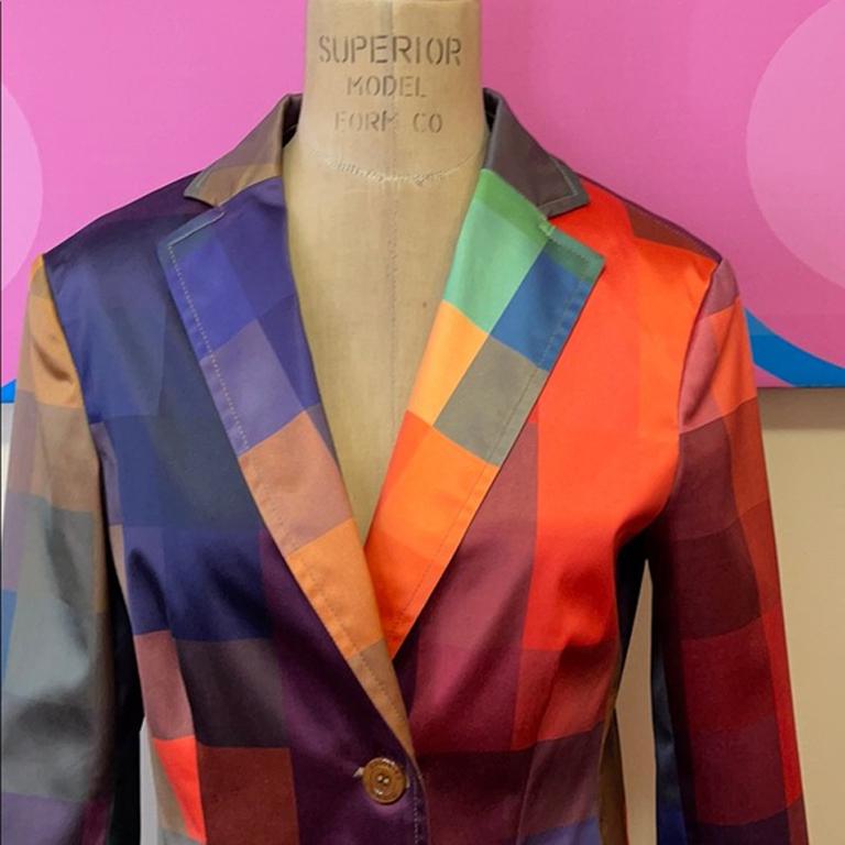 Moschino jeans stretch satin blazer checked

Be retro cool wearing this multi-color checked blazer by Moschino in a stretch satin material. Perfect with jeans!  Brand runs small.
Size 10

Across chest - 18 in.
Across waist - 15.5 in.
Shoulder to hem