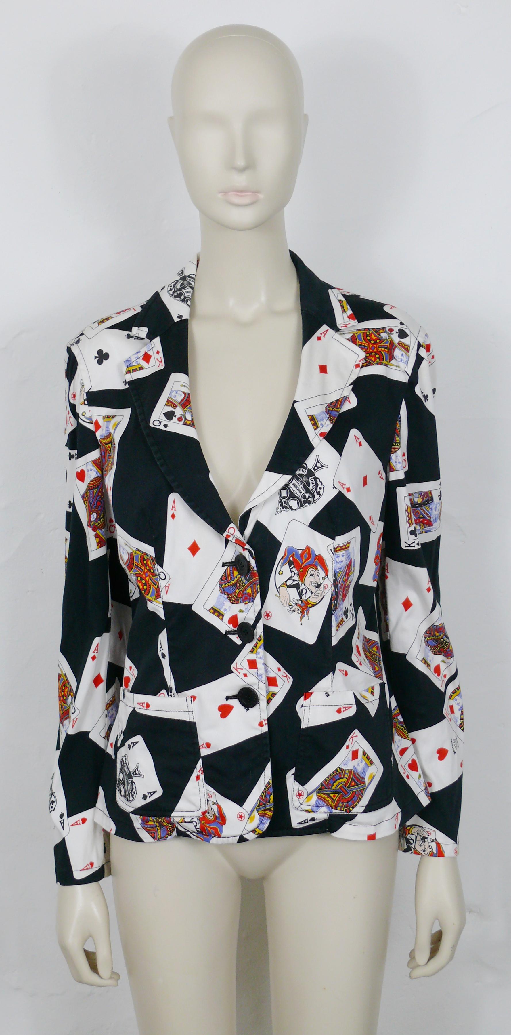 MOSCHINO JEANS vintage black supple blazer featuring a multicolored playing cards print all-over.

Front button down closure.

Label reads MOSCHINO JEANS Made in Italy.

Marked Size : I 46 / USA 12 / F 42 / GB 16 / D 42.
Please refer to