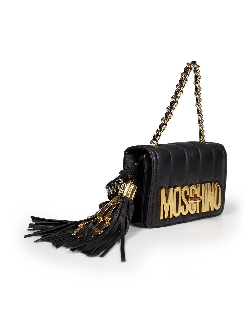 CONDITION is Very good. Minimal wear to bag is evident. Minimal scratches to the top of the front leather flap. Minor scratches to the 'M' and 'O' hardware on this used Moschino designer resale item.
 
 
 
 Details
 
 
 Limited edition
 
 Black
 
