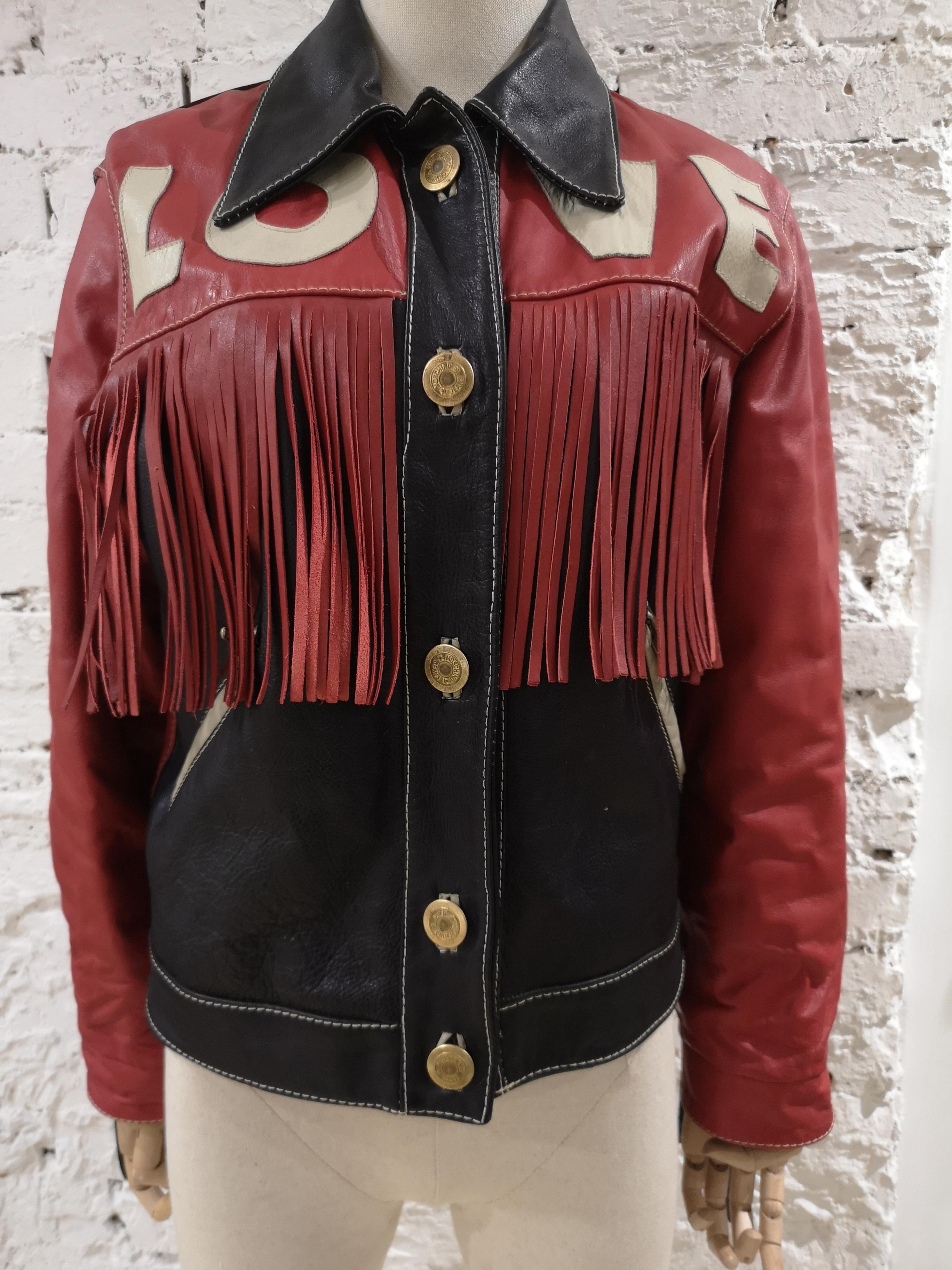 Moschino Love Red Black Leather fringes jacket
Totally made in italy in 100% Leather
size marked is 42
total lenght 60 cm 
shoulder to hem 60 cm