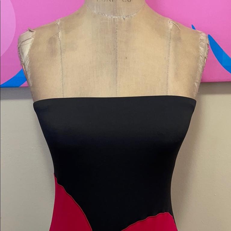 Moschino black red heart strapless dress

This super cute strapless dress is made of swimsuit material and is from the Moschino Swim line. Perfect for vacation dressing!. 
Size 34 / M

Across chest - 14 in.
Across waist - 12.5 in.
Across hips - 15.5