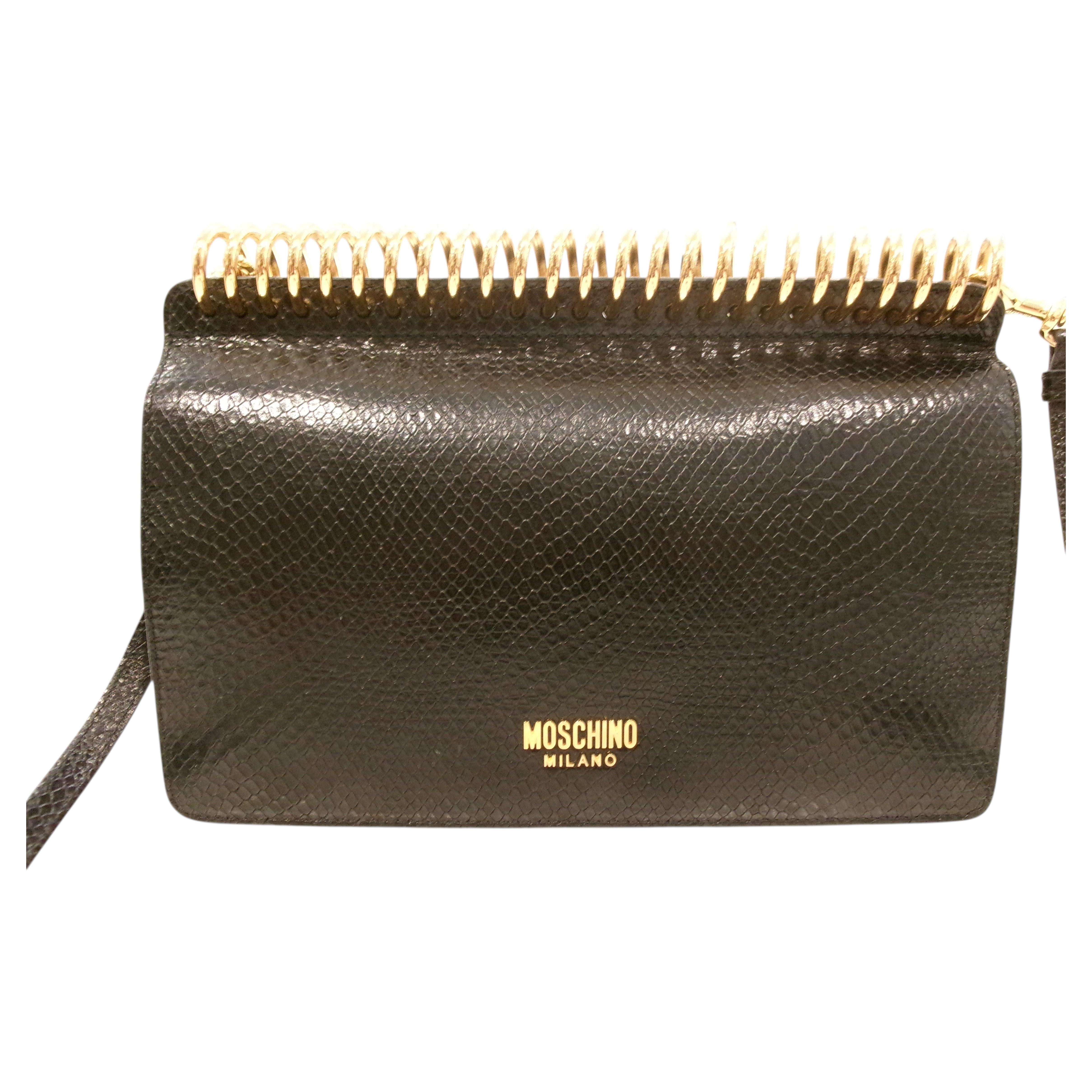 Bolso de hombro Moschino Milano en negro con relieve de serpiente en venta