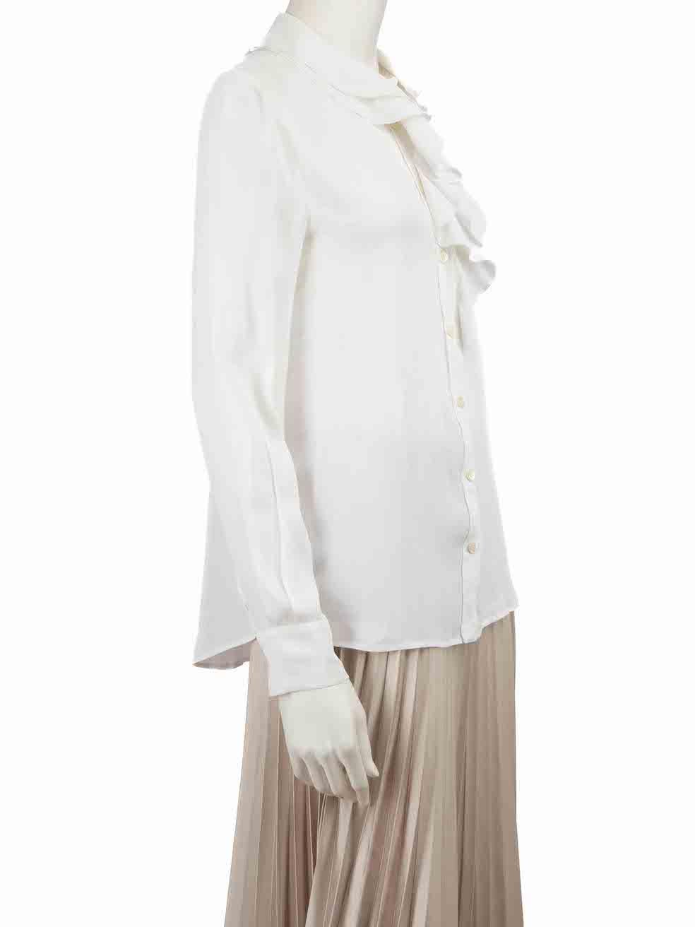 CONDITION is Very good. Minimal wear to shirt is evident. Minimal wear to the front with warping to the weave on this used Moschino Boutique designer resale item.
 
 Details
 White
 Rayon
 Blouse
 Sheer
 Button up fastening
 Rufle detail
 Long