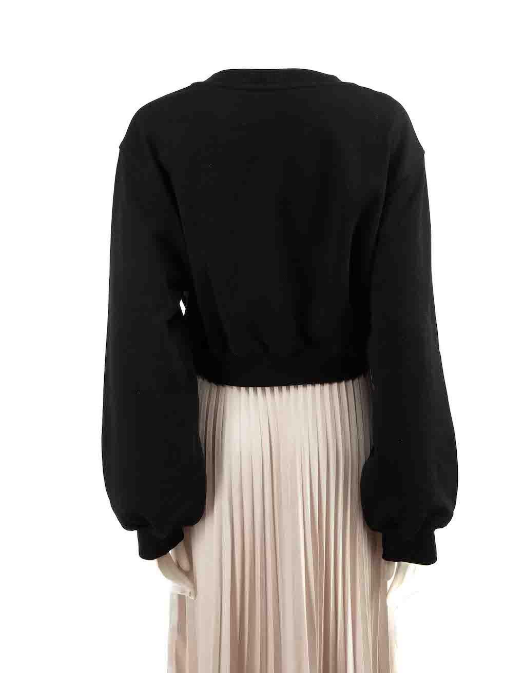 Moschino Moschino Couture! Schwarzes Sweatshirt mit Fantasiedruck und Verzierungen Größe M im Zustand „Neu“ im Angebot in London, GB