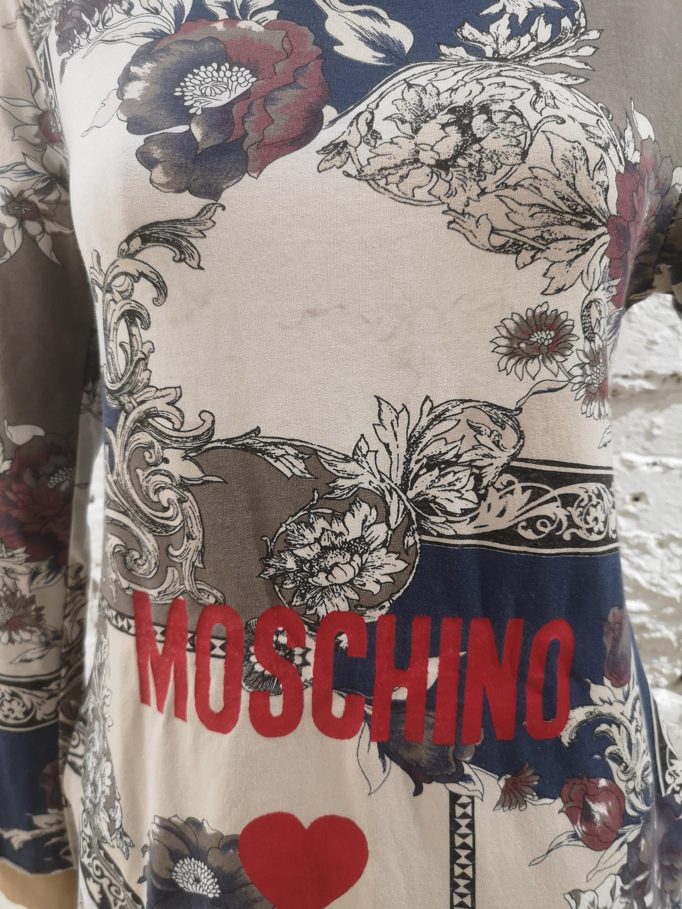 Moschino multicoloured cotton dress
totally made in italy in size L 