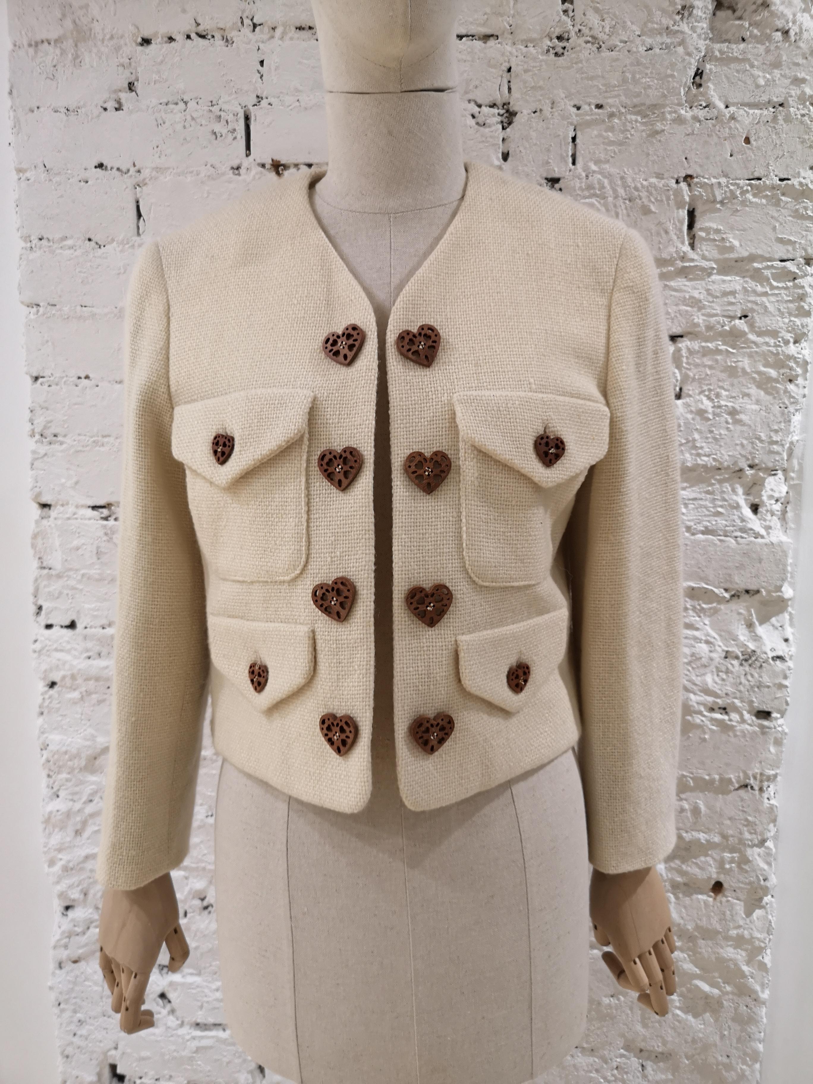 Moschino  Nature Friendly white Jacket
Totally made in italy embellished with brown hearts
open jacket
size 42
