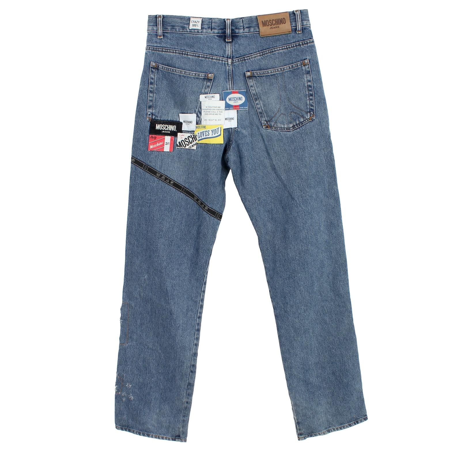 Moschino men's jeans 2000s. Patchwork prints on the front and back of the jeans, 5-pocket model, wide at the bottom. 100% cotton fabric. Made in italy.

Size: 32 / 46 It 12 Us 14 Uk

Waist: 39 cm
Inseam: 84 cm
Length: 110 cm
Hem: 21 cm
