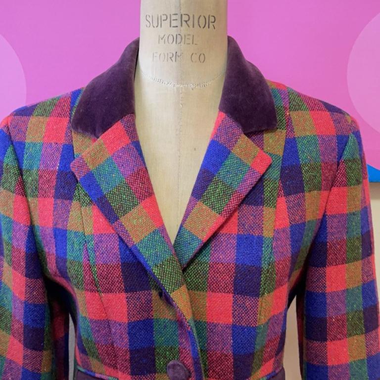 Moschino plaid wool blazer velvet trim

This vintage blazer by Moschino Cheap and Chic is perfect for Fall! The sleeves have been shortened / altered and not very well as one is sort of twisted. Please see measurements and also brand runs