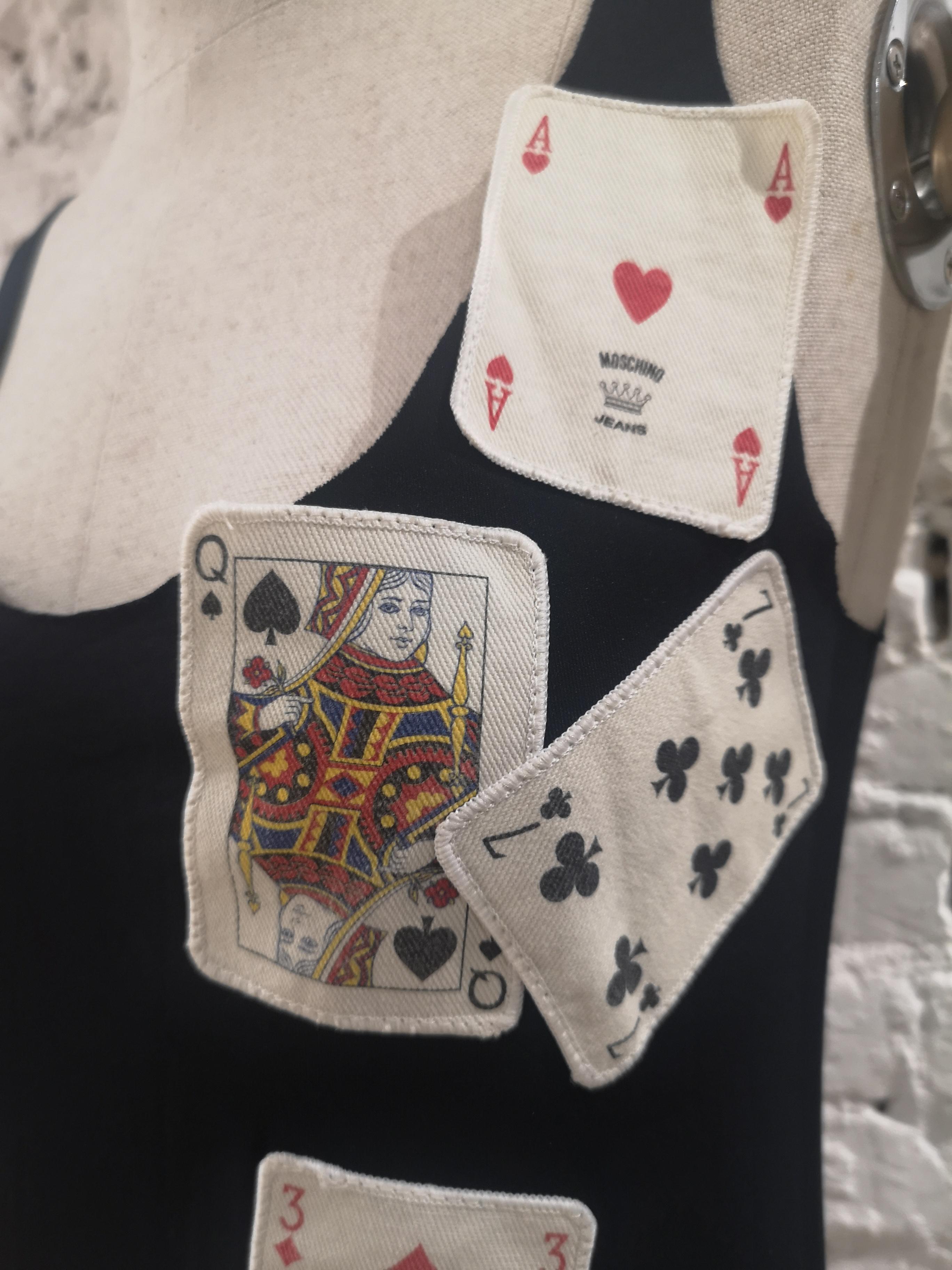Moschino playing cards t-shirt
totally made in italy in size M 
total lenght 52 cm
size marked 42 it