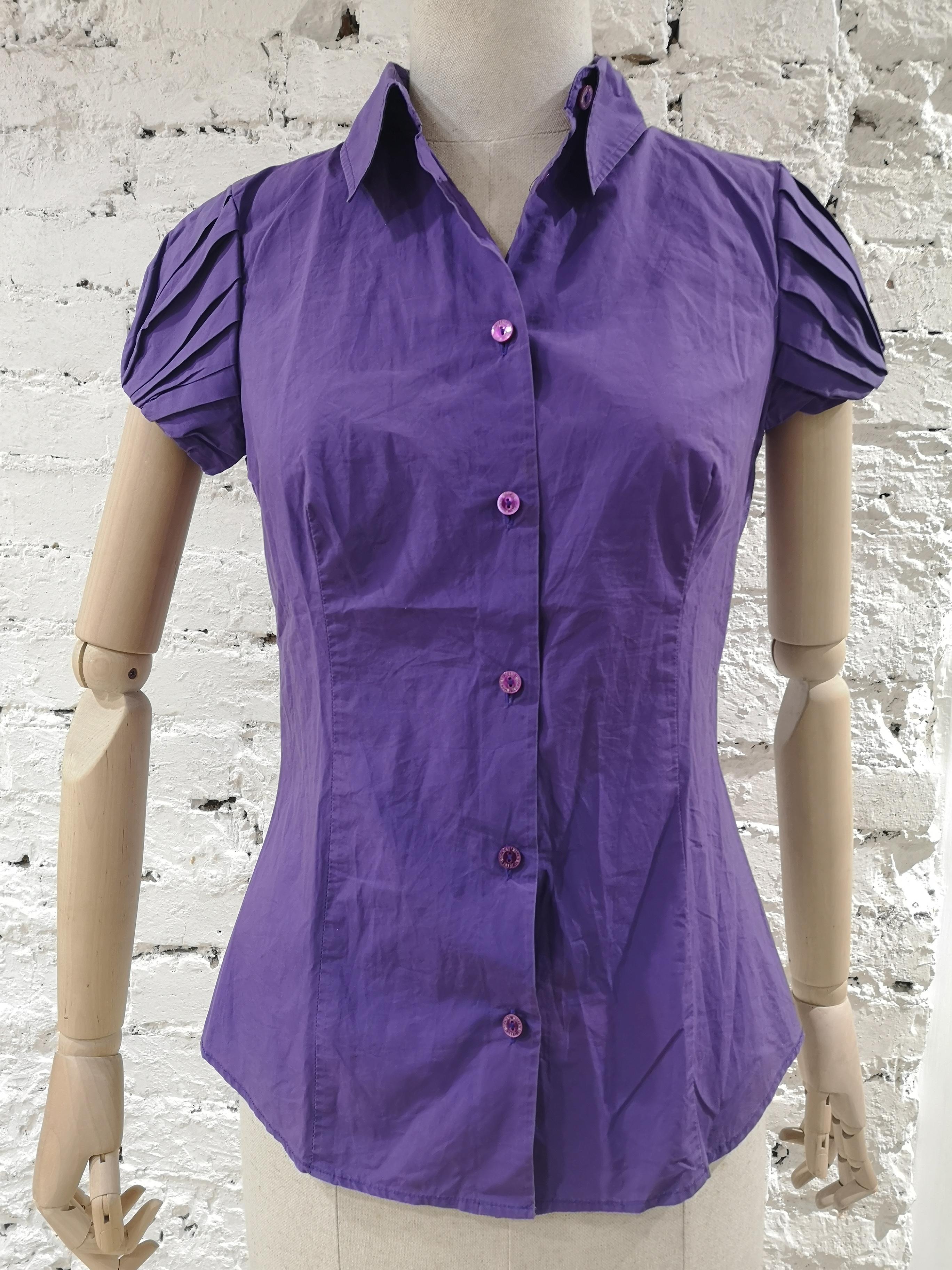 Moschino purple cotton shirt
totally made in italy in size 42