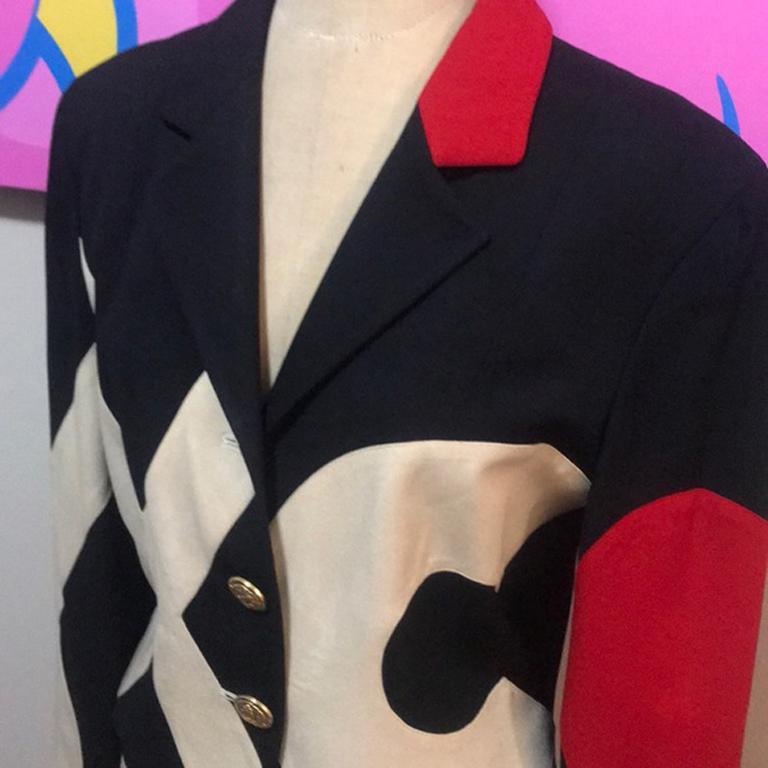Moschino red cheap chic heart love jacket

Be retro cool in this vintage jacket by Moschino with a heart on your sleeve and XO pattern ! Has problems - stains in inside lining at armpits and collar and missing top gold button and one side a tiny bit