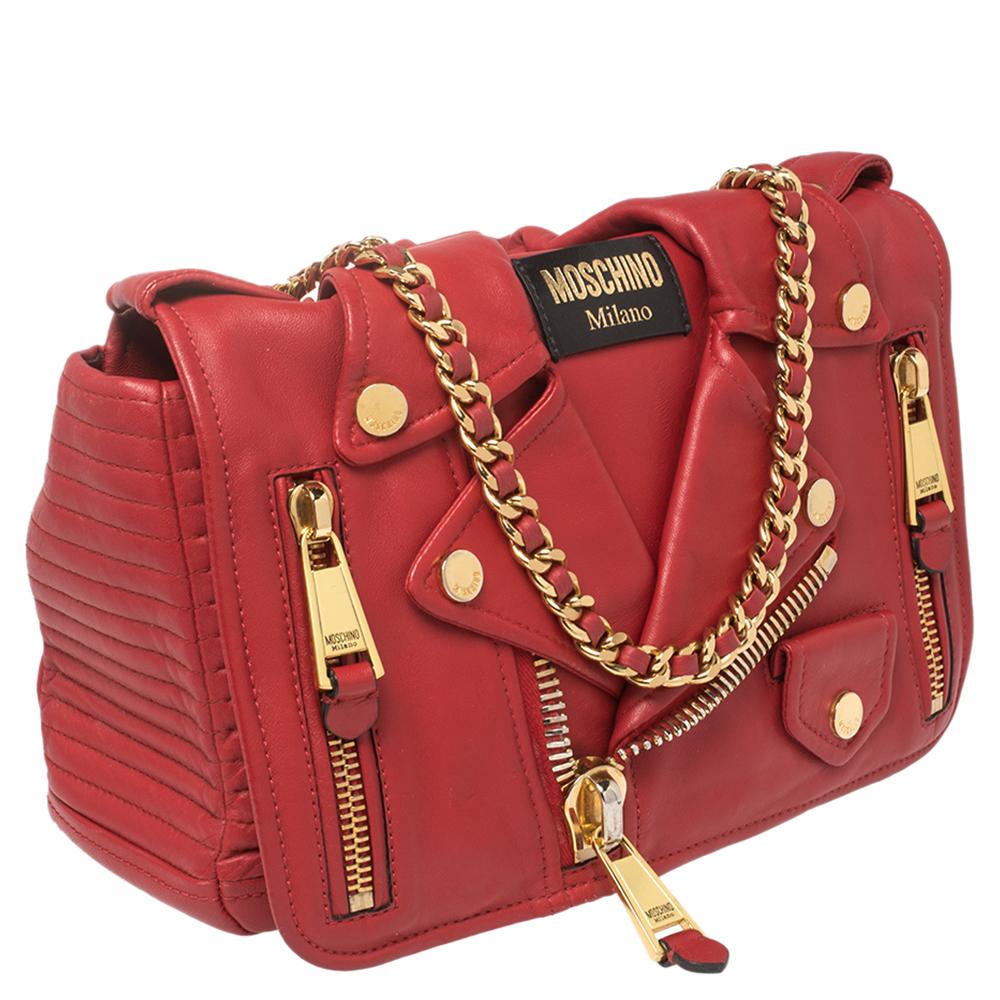 This quirky shoulder bag is a stunning piece of accessory to own. It is artfully designed in the shape of a biker jacket that can be worn on your shoulder. It has zippers in gold-tone, snap buttons, a collar, and the brand's name comes as the label