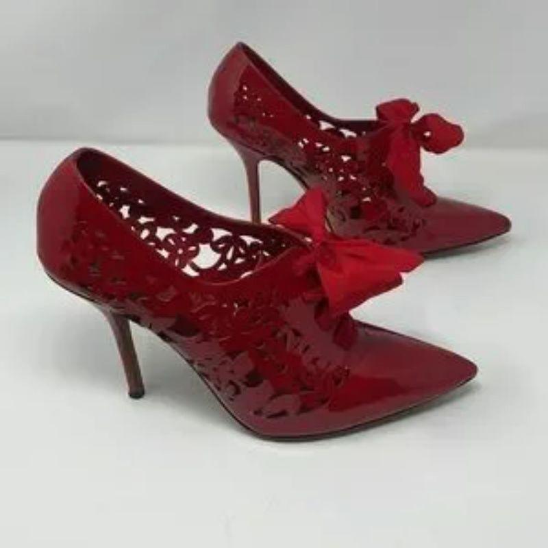 Moschino red patent leather lace up booties

Be retro glam wearing these vintage red patent leather lace up booties! Red ribbon bow. Light wear on leather soles NO BOX.
Size 40 M
Patent Leather
Made In Italy
Heel Height: 4 1/4 inches