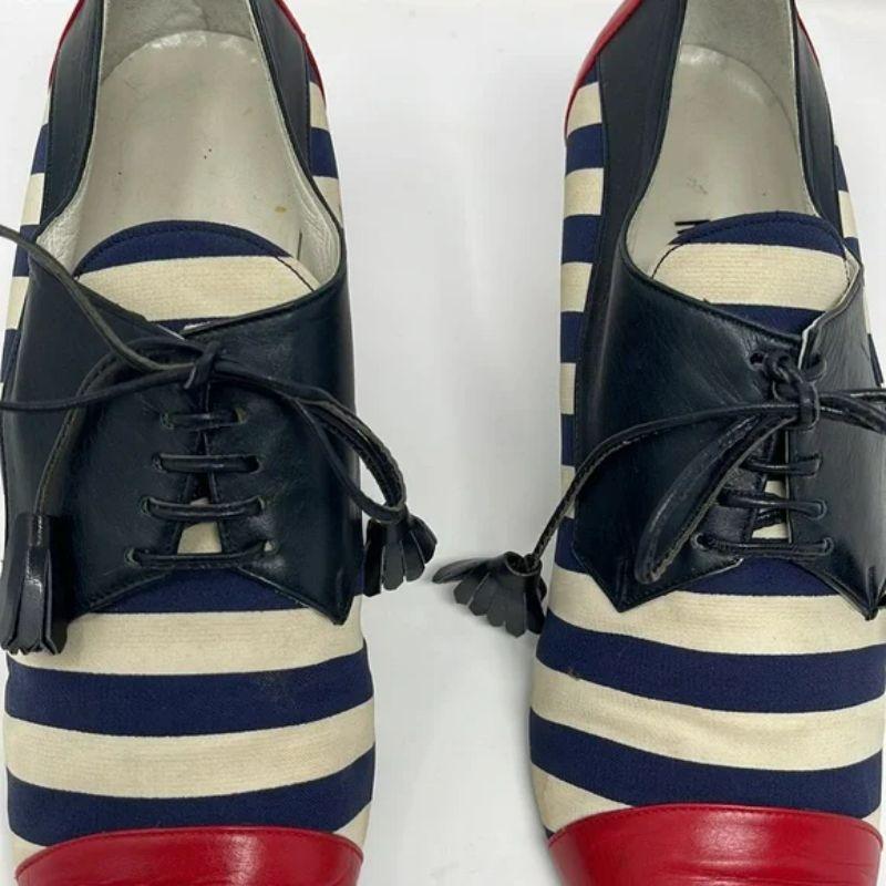 Moschino red white blue striped spectator pumps vintage

Be retro cool wearing these vintage Moschino shoes with leather and fabric detail. No Box.

Size 37 1/2 M
Leather and fabric.
Made in Italy

Note: These are stains on the fabric, please see