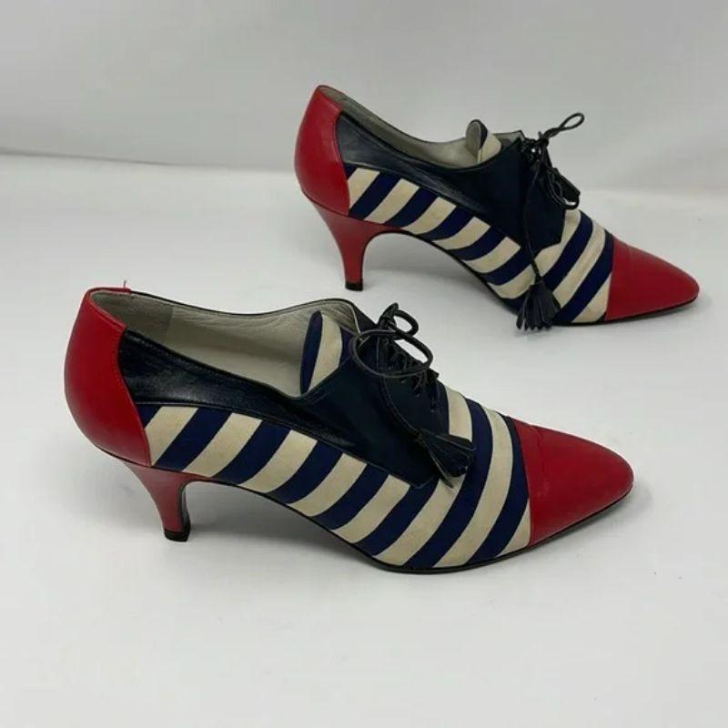 red and white spectator pumps