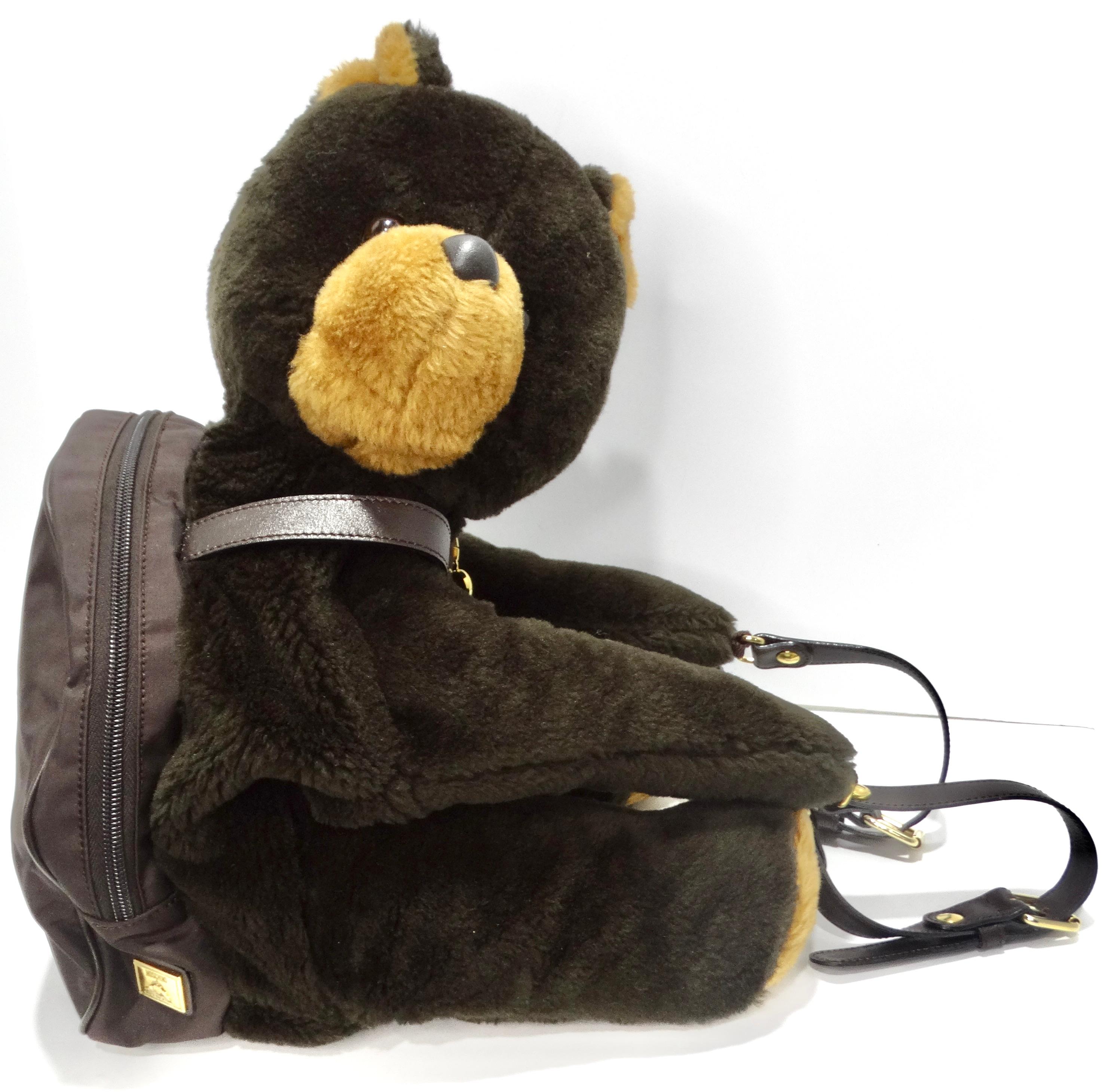 Do not miss out on the Moschino Redwall 1990s Teddy Bear Backpack – a whimsical and adorable accessory that seamlessly merges fashion with playfulness. This statement backpack is not just a practical storage solution; it's a charming collectors