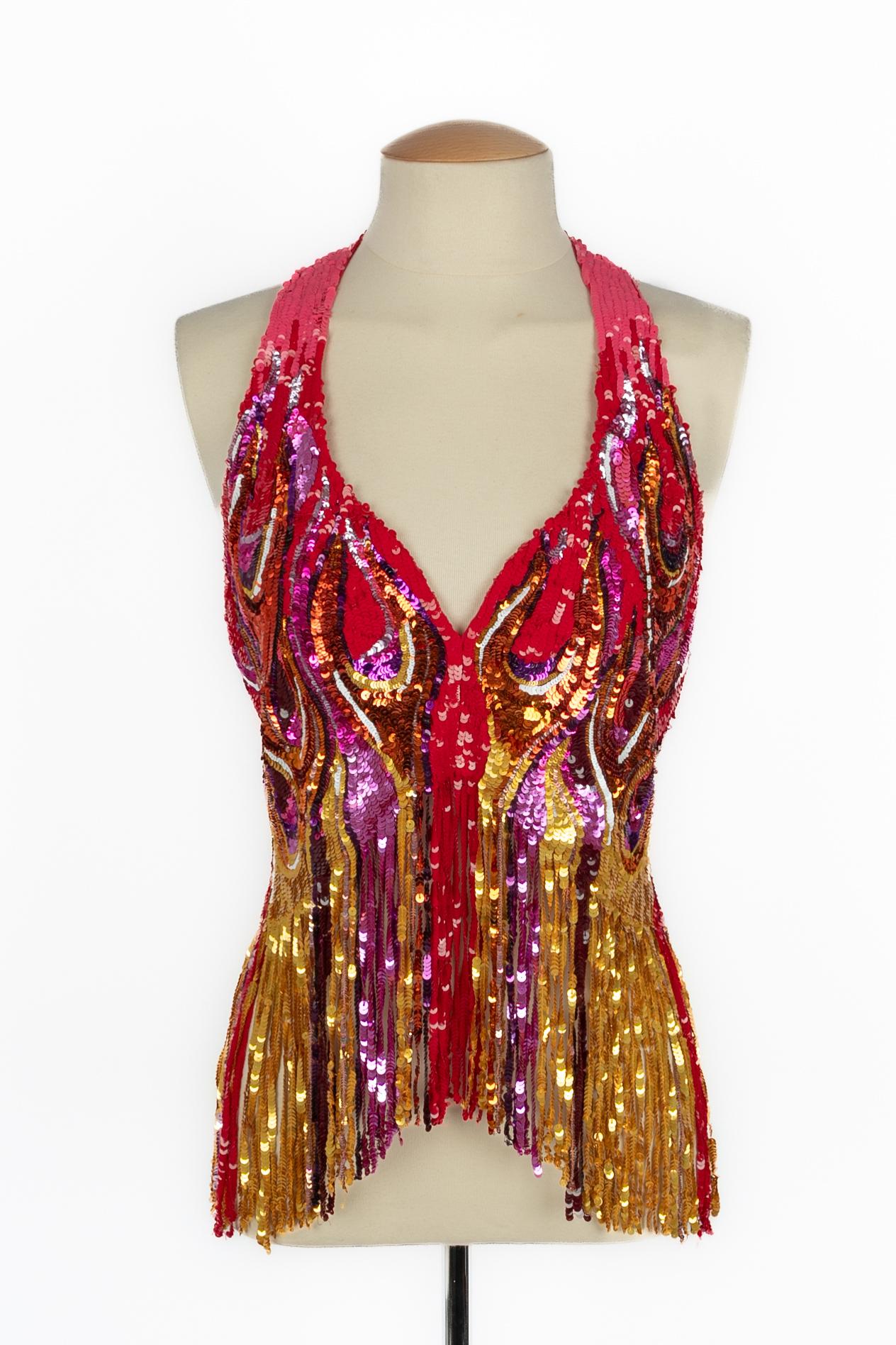MOSCHINO - (Made in Italy) Top mit roten, goldenen und violetten Pailletten. Größe 38FR.

Bedingung:
Sehr guter Zustand

Abmessungen:
Brustumfang: 44 cm - Länge: 75 cm

SKU:FH152