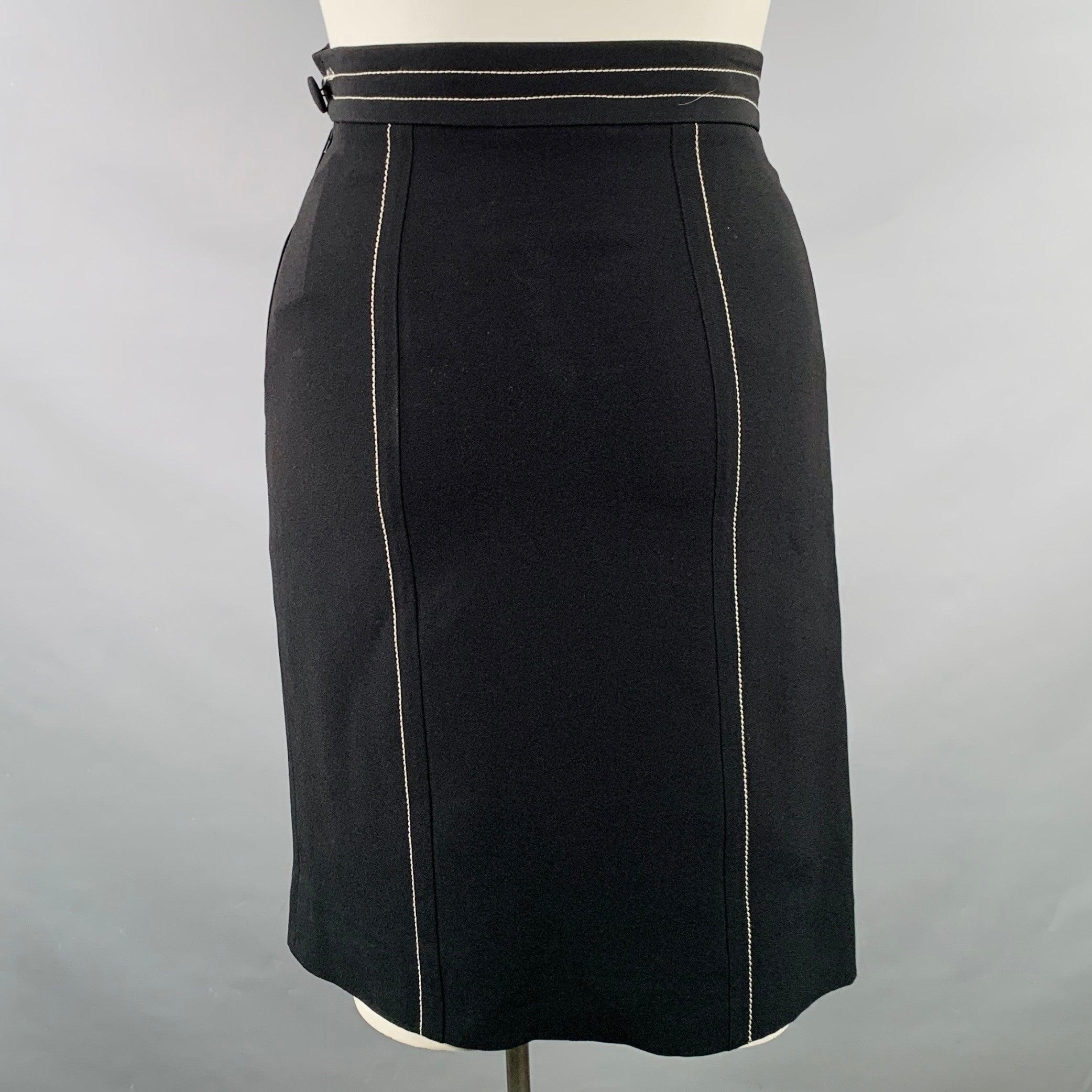 CHEAP AND CHIC by MOSCHINO pencil skirt in a black rayon blend fabric featuring white contrast stitching, high waisted style, and side zipper closure.Excellent Pre-Owned Condition. 

Marked:   IT 46 

Measurements: 
  Waist: 30 inches Hip: 38 inches