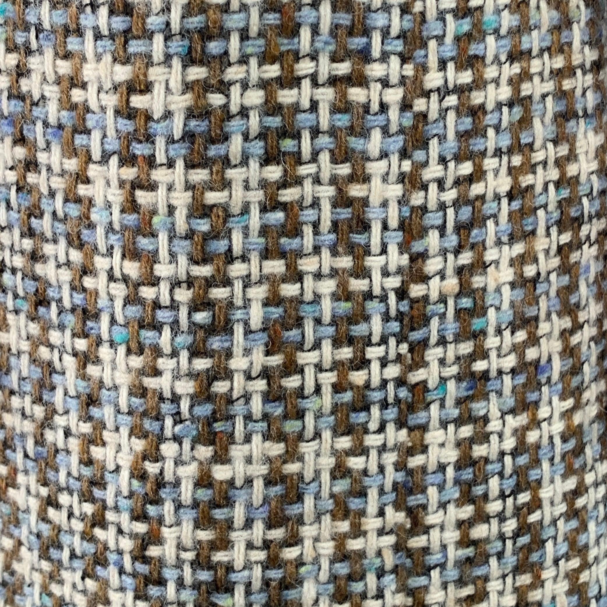 MOSCHINO coat
in a brown, blue, and cream wool featuring an all over woven pattern, floral embellishment, raw edge design, and button closure. Made in Italy.Excellent Pre-Owned Condition. 

Marked:   size not marked 

Measurements: 
 
Shoulder: 15