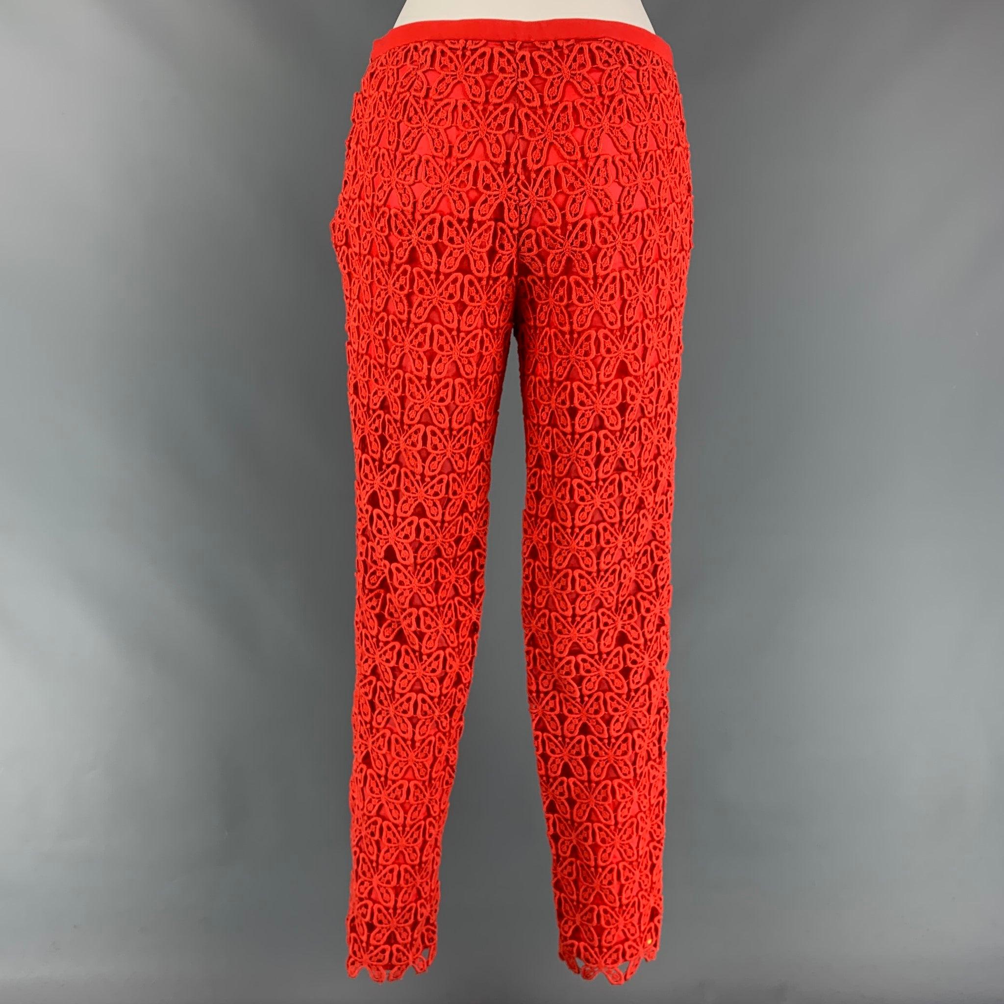 CHEAP AND CHIC by MOSCHINO dress pants in a coral orange triacetate blend featuring a guipure lace design, slim fit, and a side zipper closure.
New With Tags.
 

Marked:   I 40 / D 36 / F 36 / GB 8 / USA 6 

Measurements: 
  Waist: 30 inches  Rise: