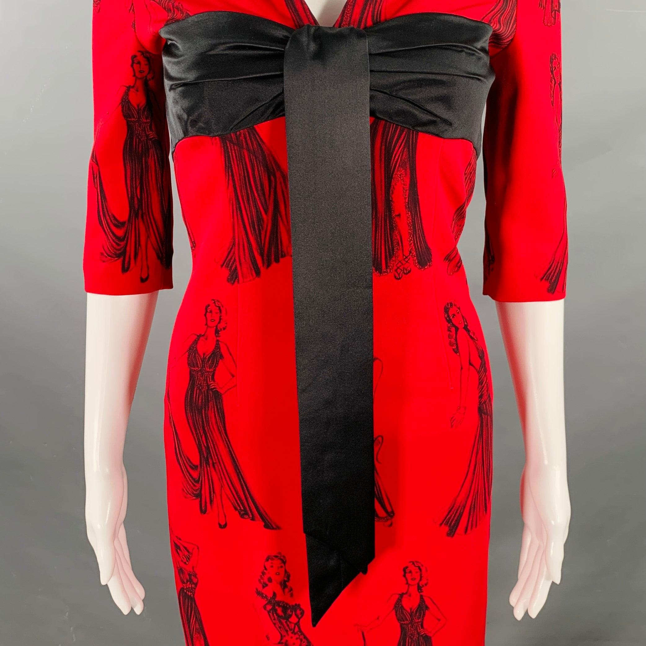 MOSCHINO COUTURE cocktail dress
in a red viscose blend fabric featuring a black figures in gowns print, 3/4 sleeves, and black bow sash detail. Made in Italy.Very Good Pre-Owned Condition.
 Minor snagging. 

Marked:   IT 40 

Measurements: 
