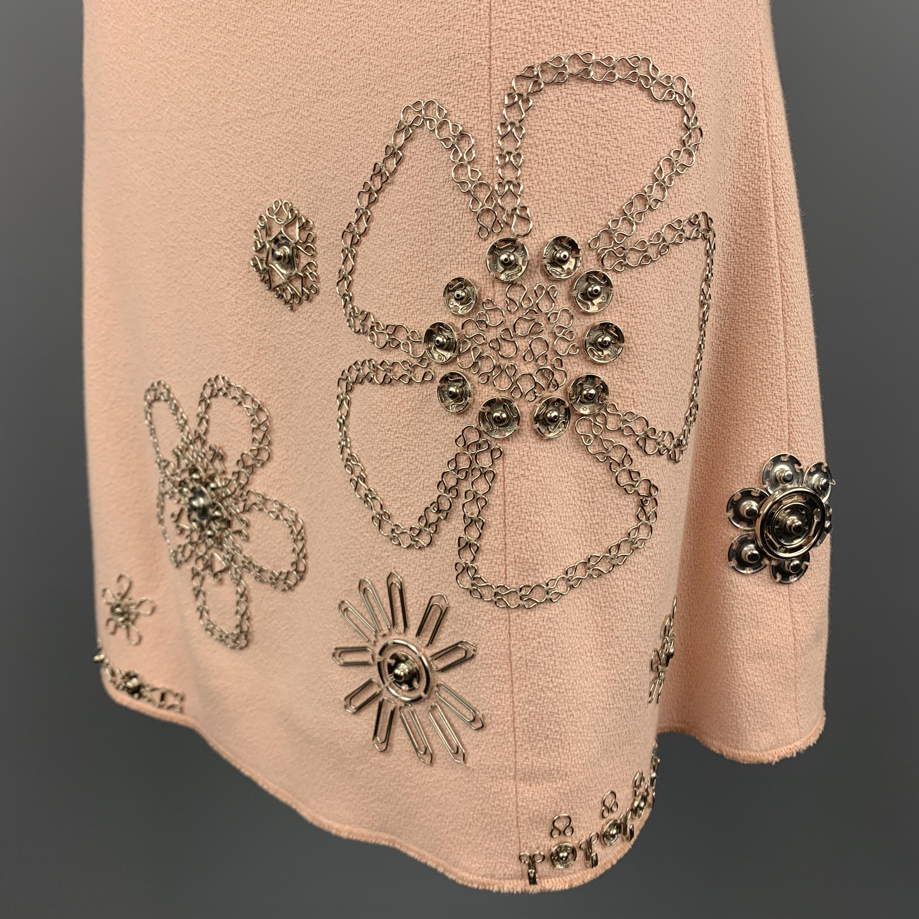 MOSCHINO A-line Skirt comes in a rose tone in a textured cotton material, with silver tone metal hook & eye, press buttons and staples embellishments. Made in Italy.
 
Excellent Pre-Owned Condition.
Marked: 6
 
Measurements:
 
Waist: 26 in.
Hip: 35