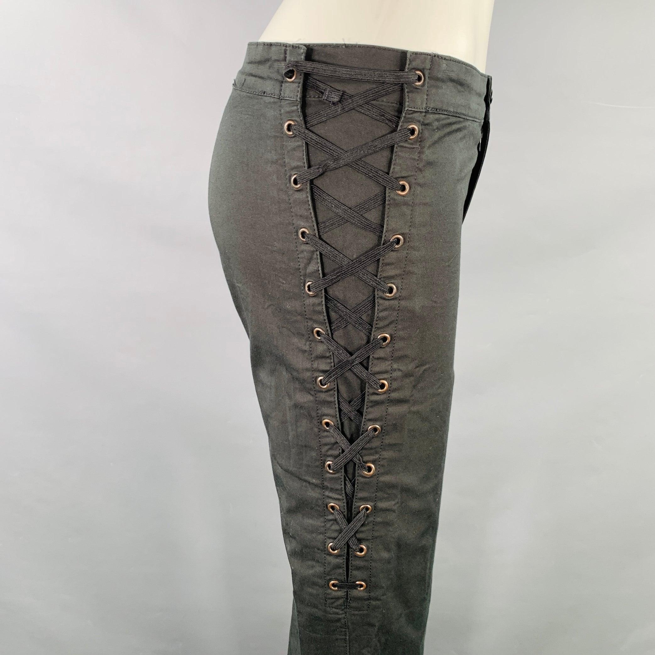 MOSCHINO casual pants
in a black cotton stretch blend featuring side corset lace up details, flared leg, and zip fly closure. Made in Italy.Very Good Pre-Owned Condition. Minor marks on cuff. 

Marked:   IT 42 

Measurements: 
  Waist: 29 inches