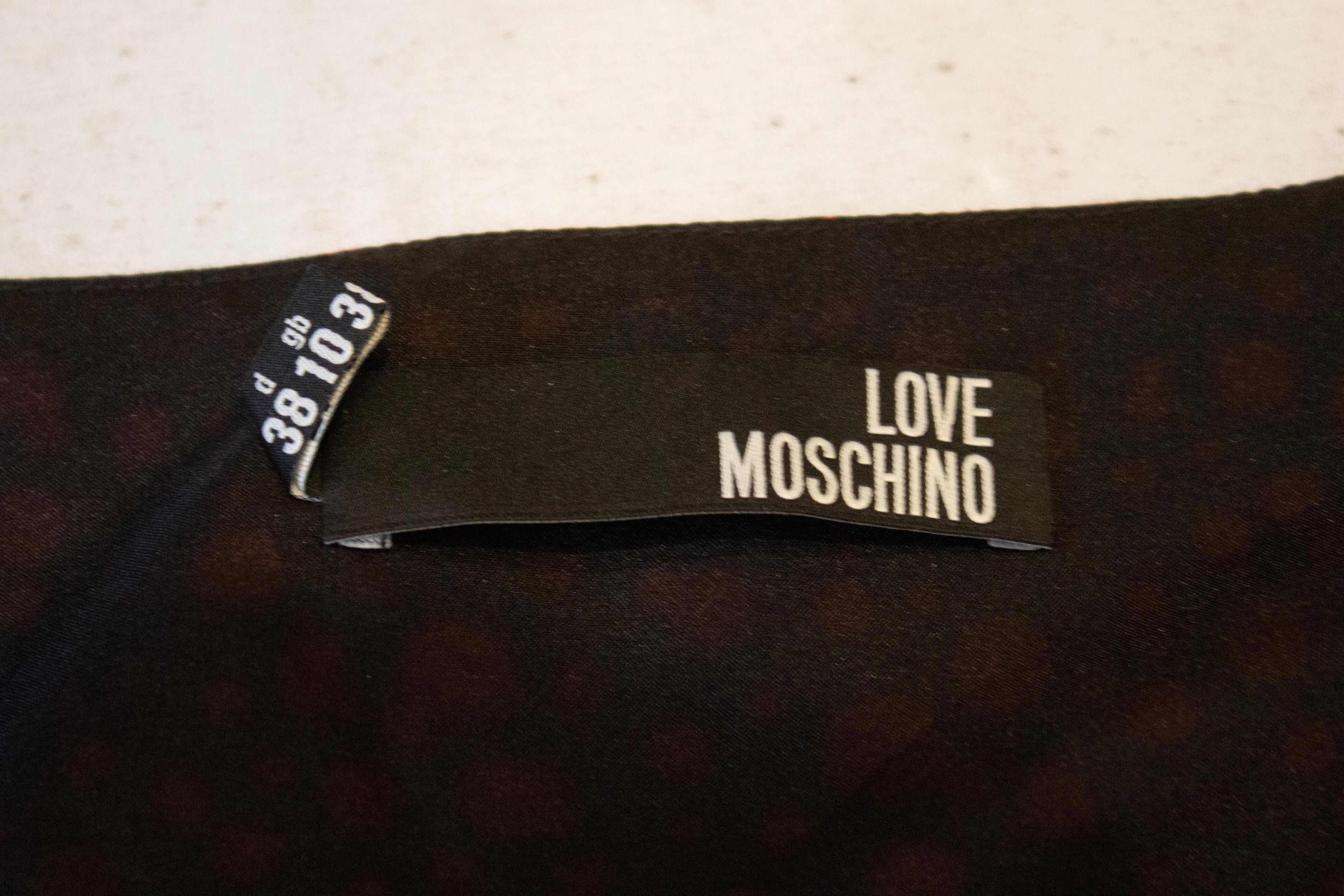 Moschino - Robe à carreaux avec enveloppe sur le devant. en vente 2