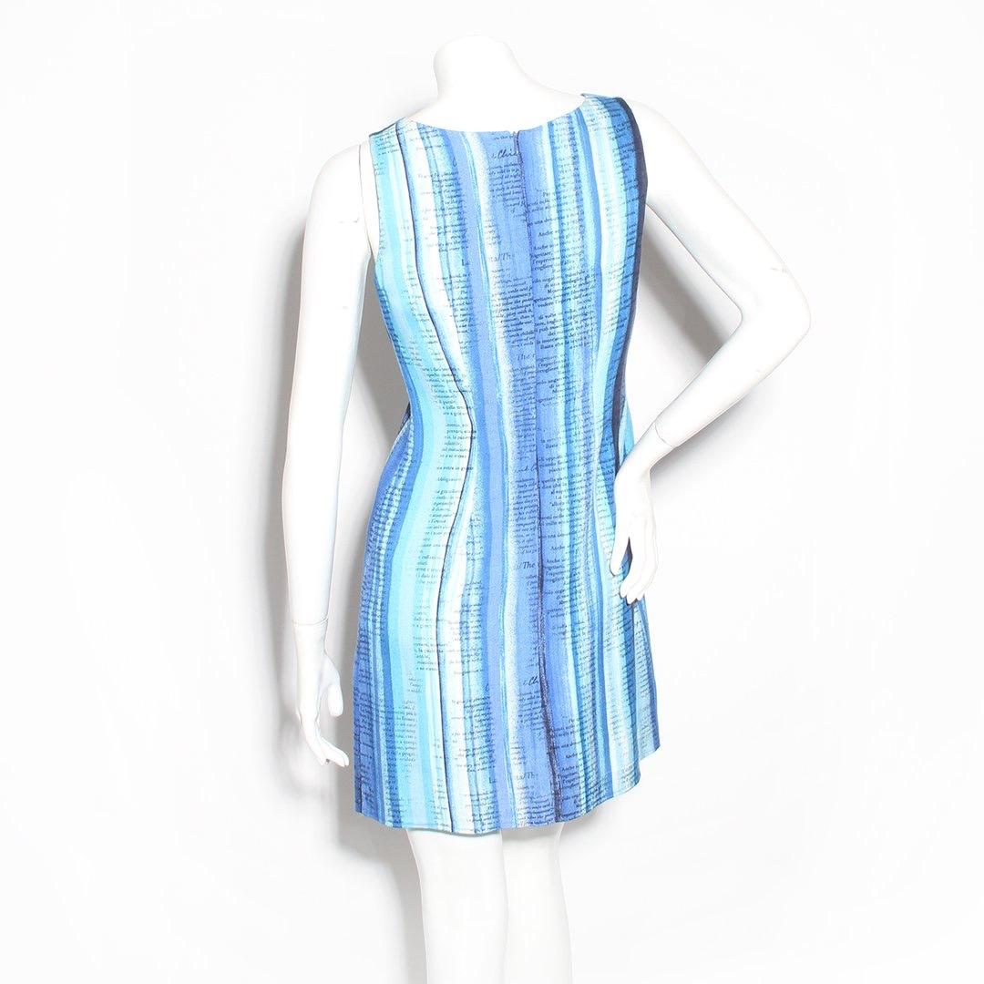 Text print dress by Moschino Cheap and Chic 
Shift dress
Blue and white striped graphic print
Round neck 
Sleeveless
Zip back closure 
Made in France
Condition: Excellent, little to no visible wear (see photos)

Size/Measurements: (approximate,