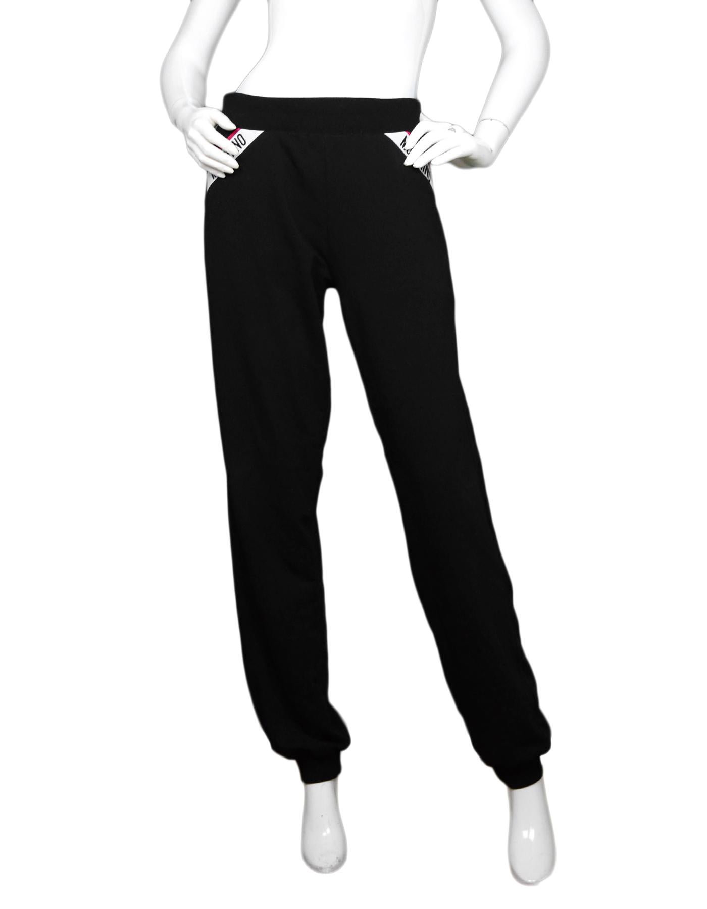 black tape logo track pants