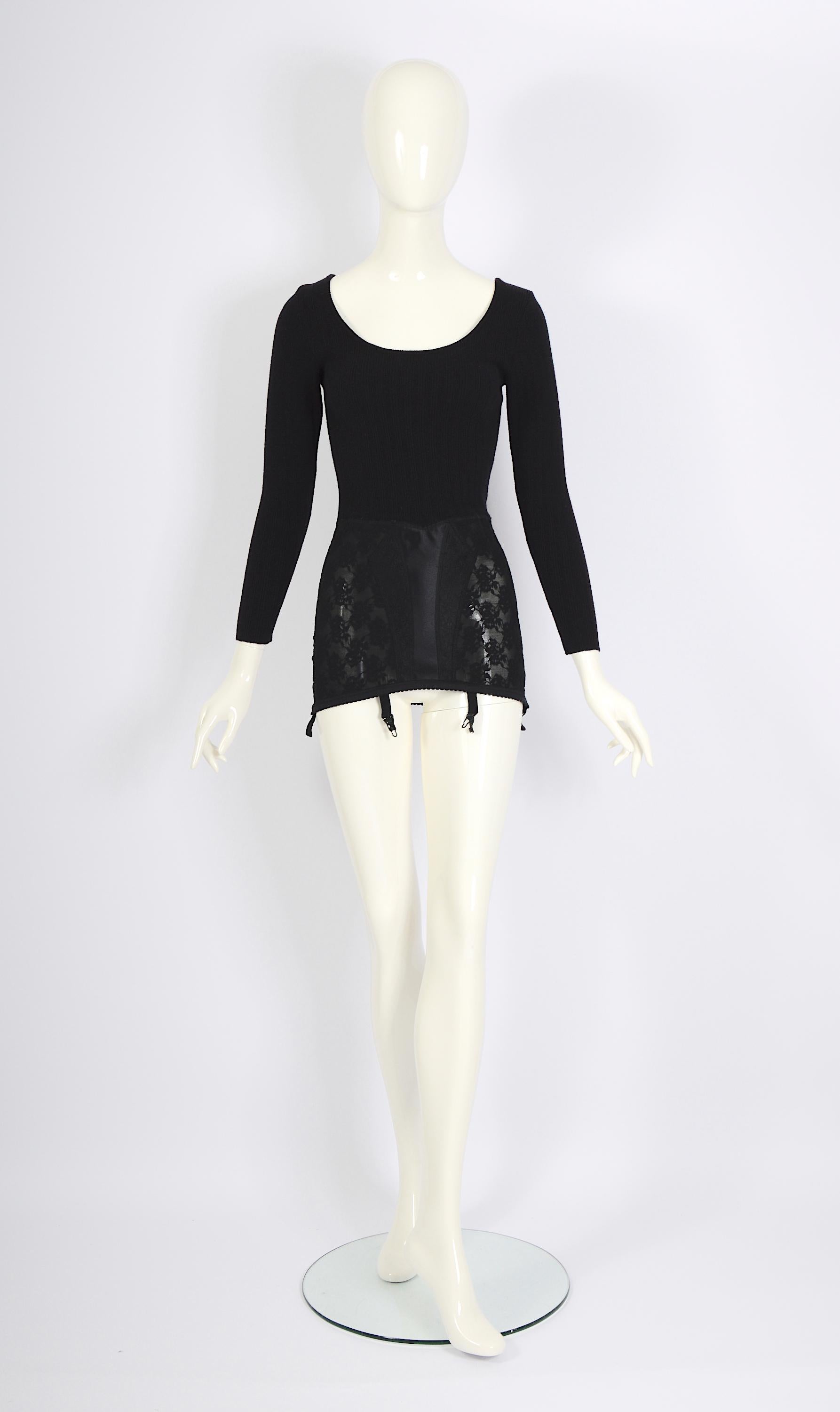 Gorgeous collectors archival vintage 1980s Moschino by Franco Moschino micro mini dress or top, featuring a wooly top with an attached corset. Just throw on some black tights and stylish heels to complete the look. It's effortlessly chic and totally