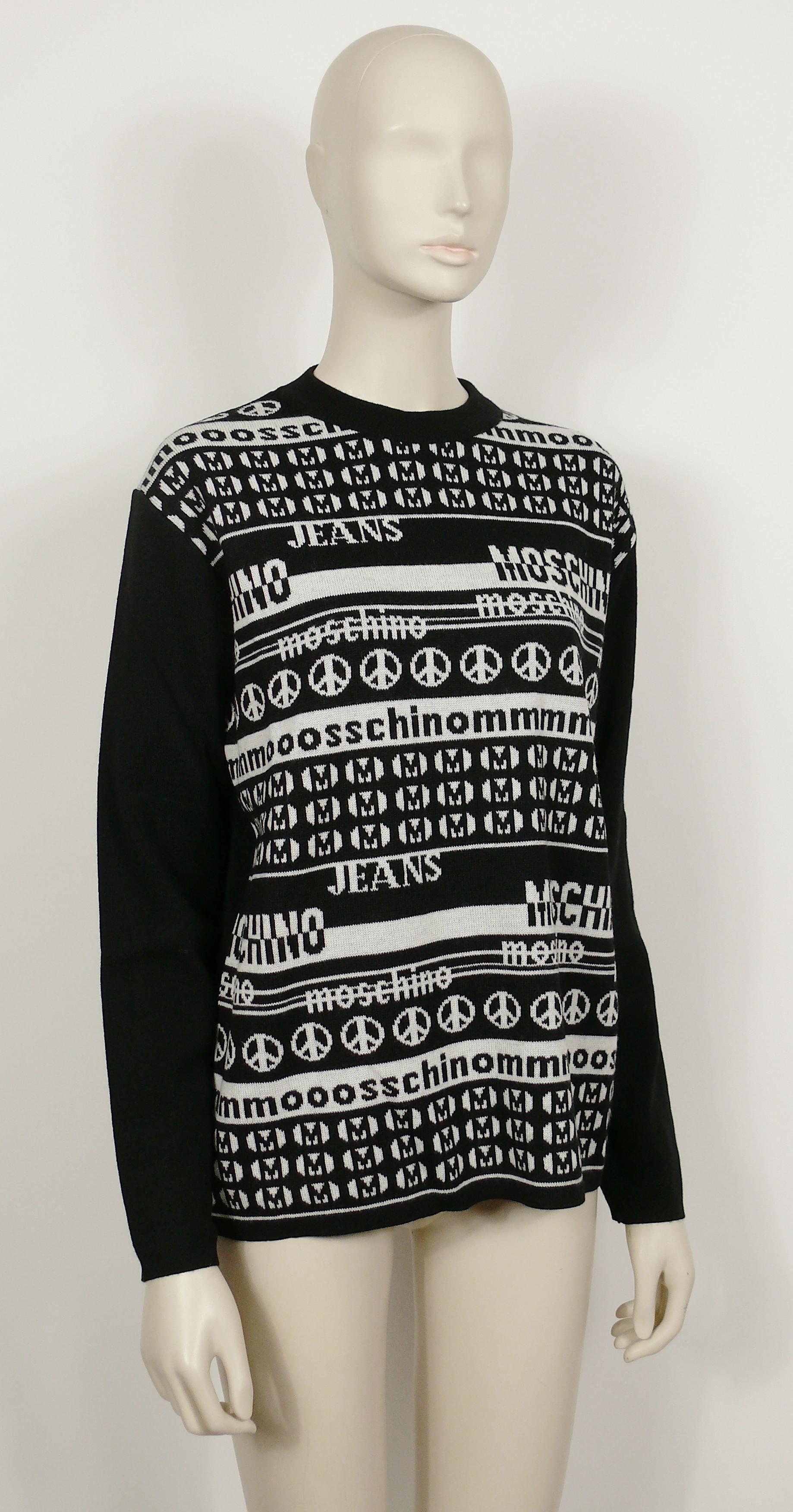 MOSCHINO vintage light sweater featuring a black and white computer screen desing on front with MOSCHINO, M, Peace signs...

Round neck.
Long sleeves.

Label reads MOSCHINO JEANS.
Made in Italy.

Composition label reads : 100% Wool.

Size label