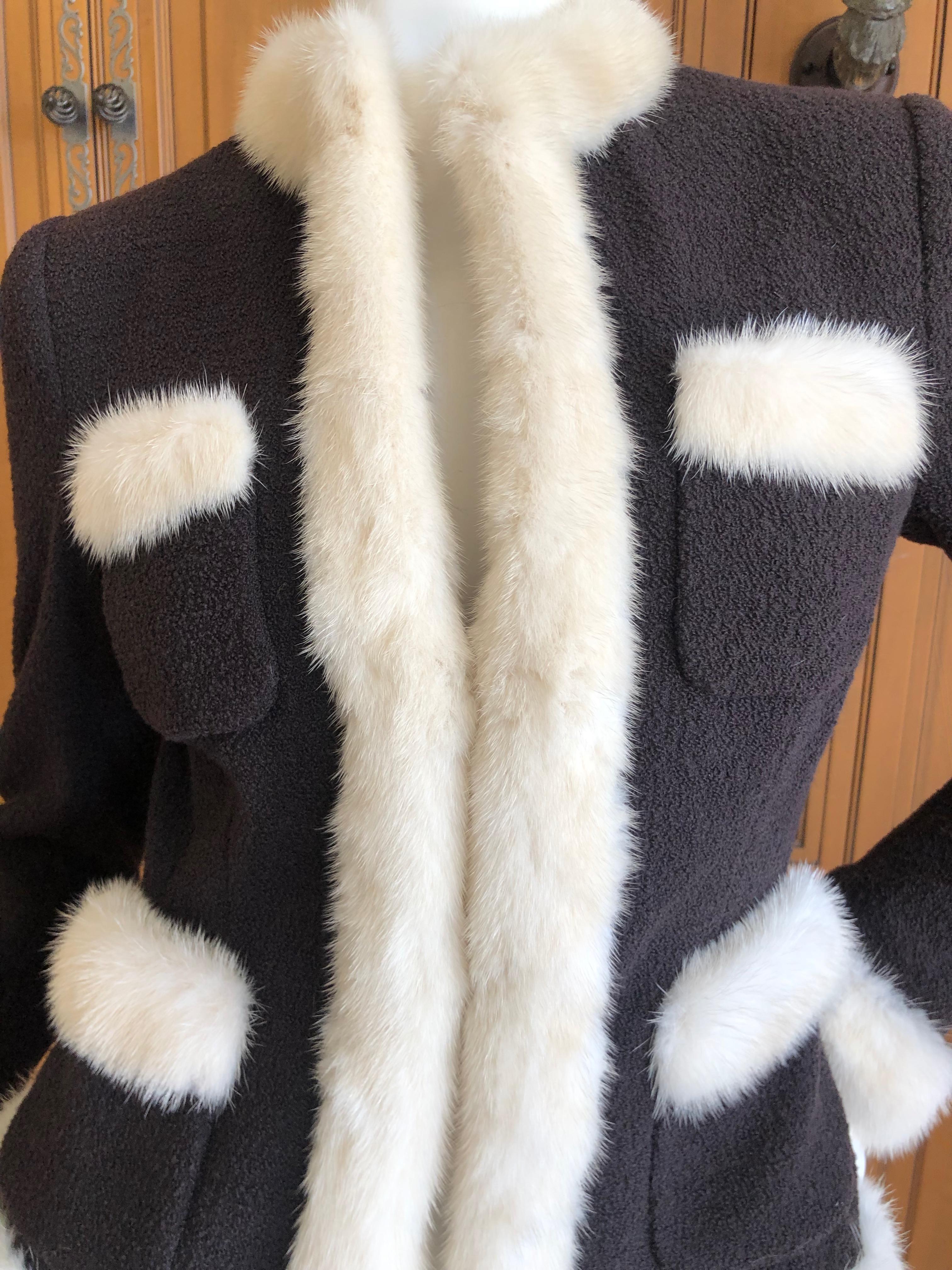 Moschino Vintage Black Boucle Jacket with Mink Fur Trim.
Ivory mink trim on the cuffs, hem and pockets, so chic.
Size 8 US
Bust 36